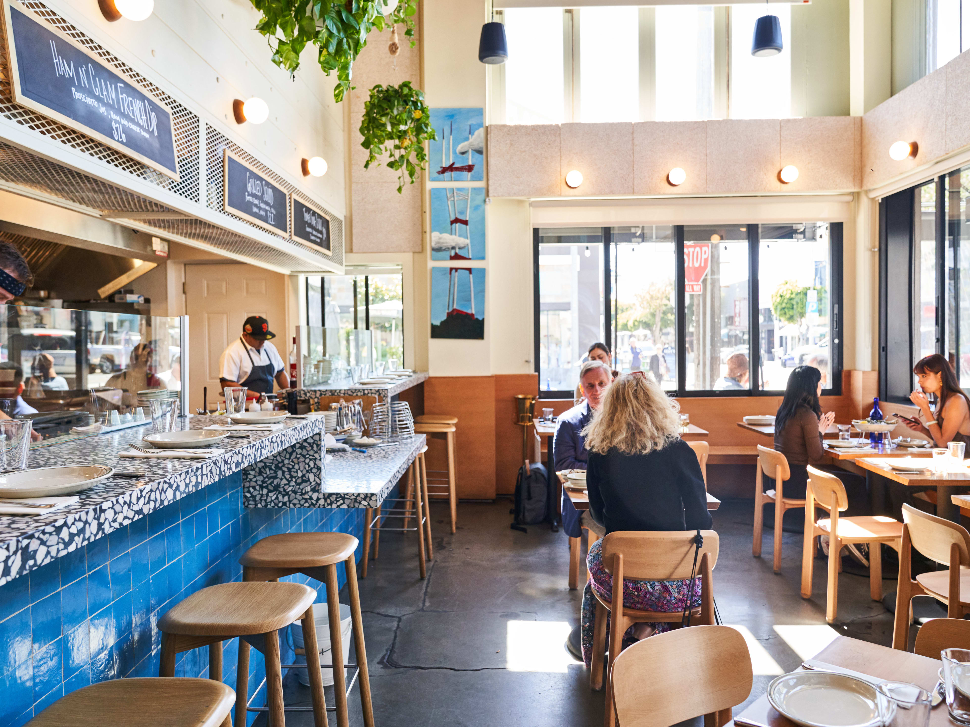 The blue-tiled interior at Popi's Oysterette