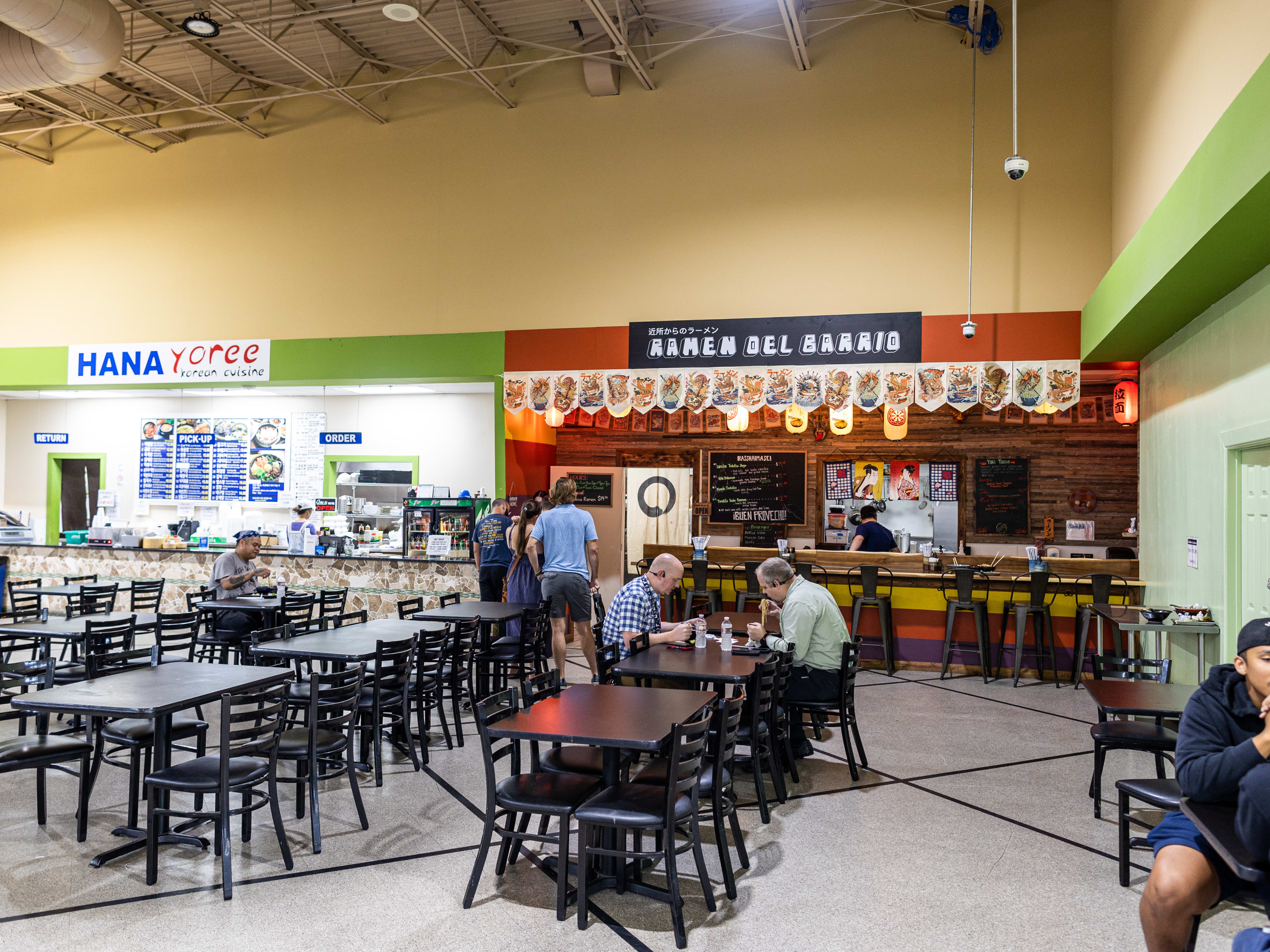 The dining area and Ramen Del Barrio stall next to another food stall.