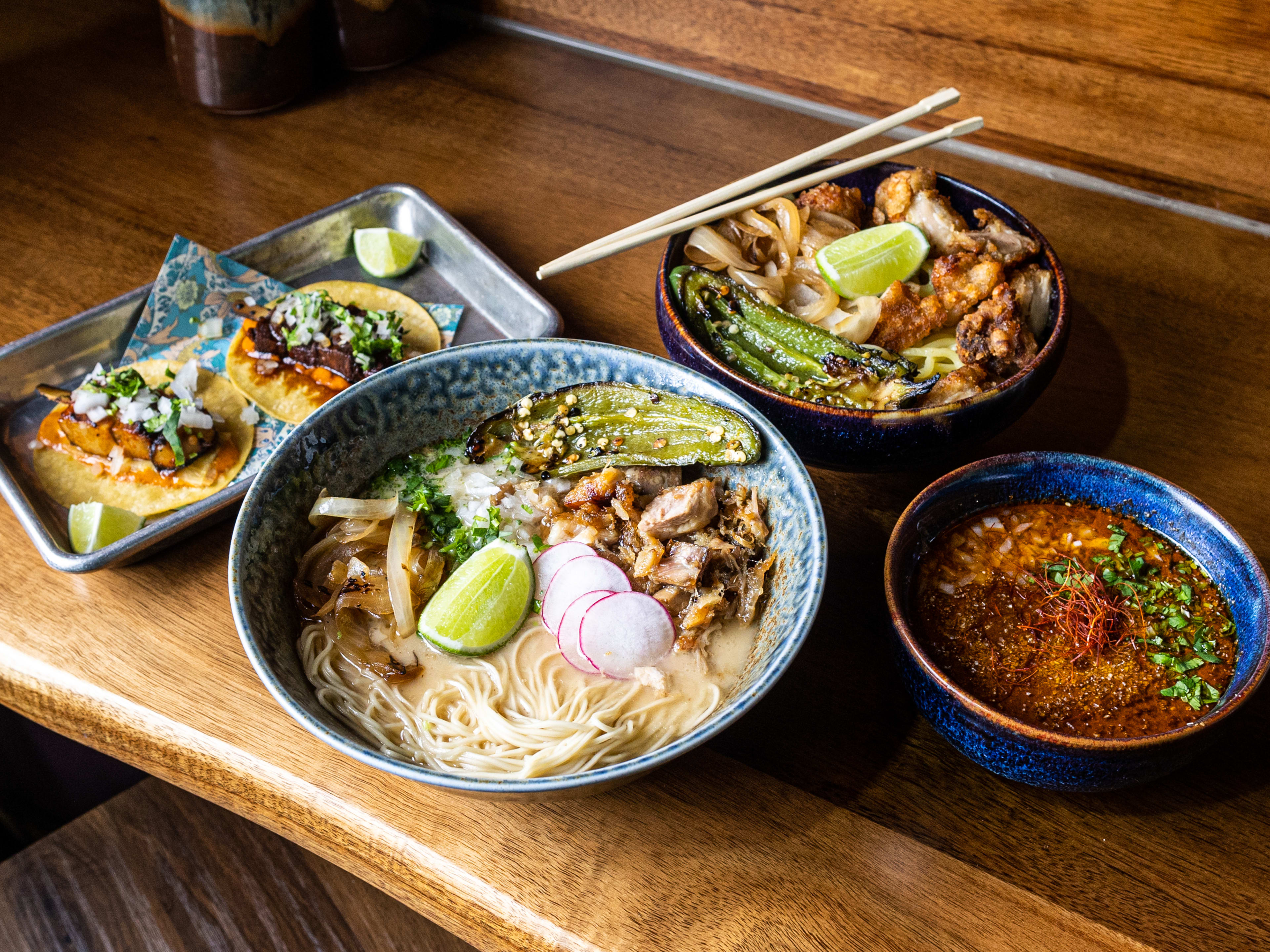 A spread of dishes from Ramen Del Barrio.