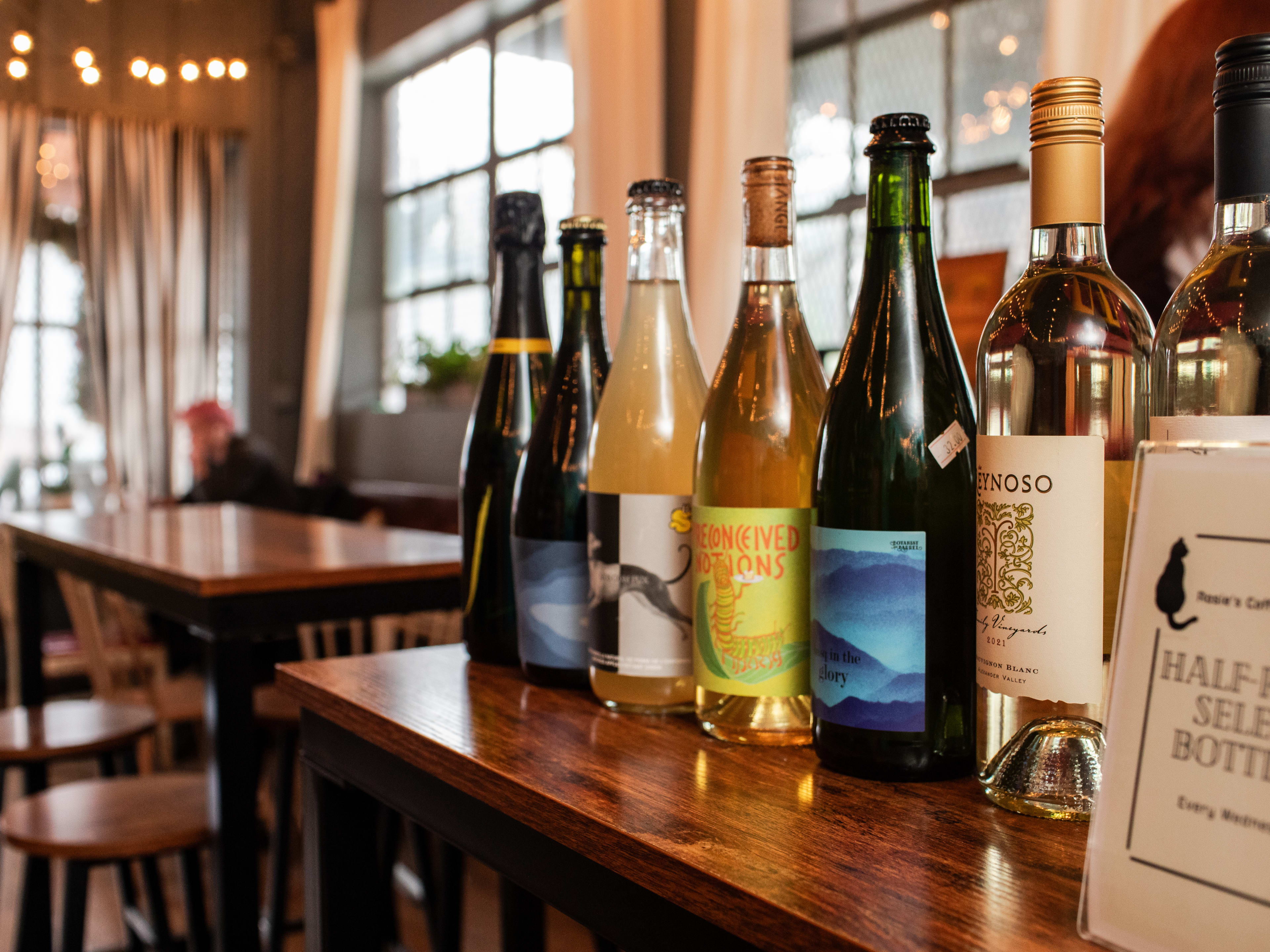 Wine Bottles on counter at Rosie's Coffee & Wine Bar.