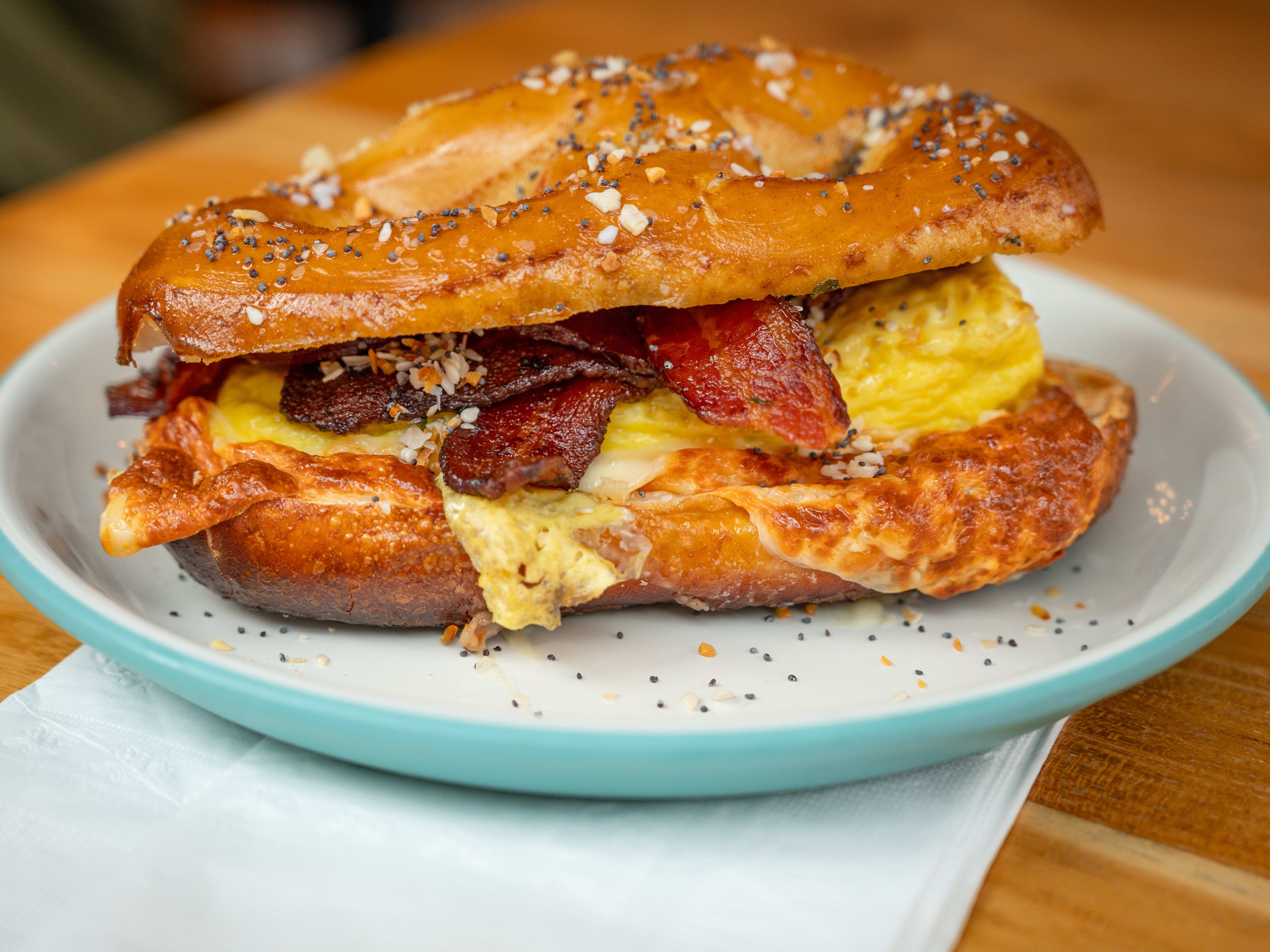 This is a breakfast pretzel sandwich from Rowhome Coffee.