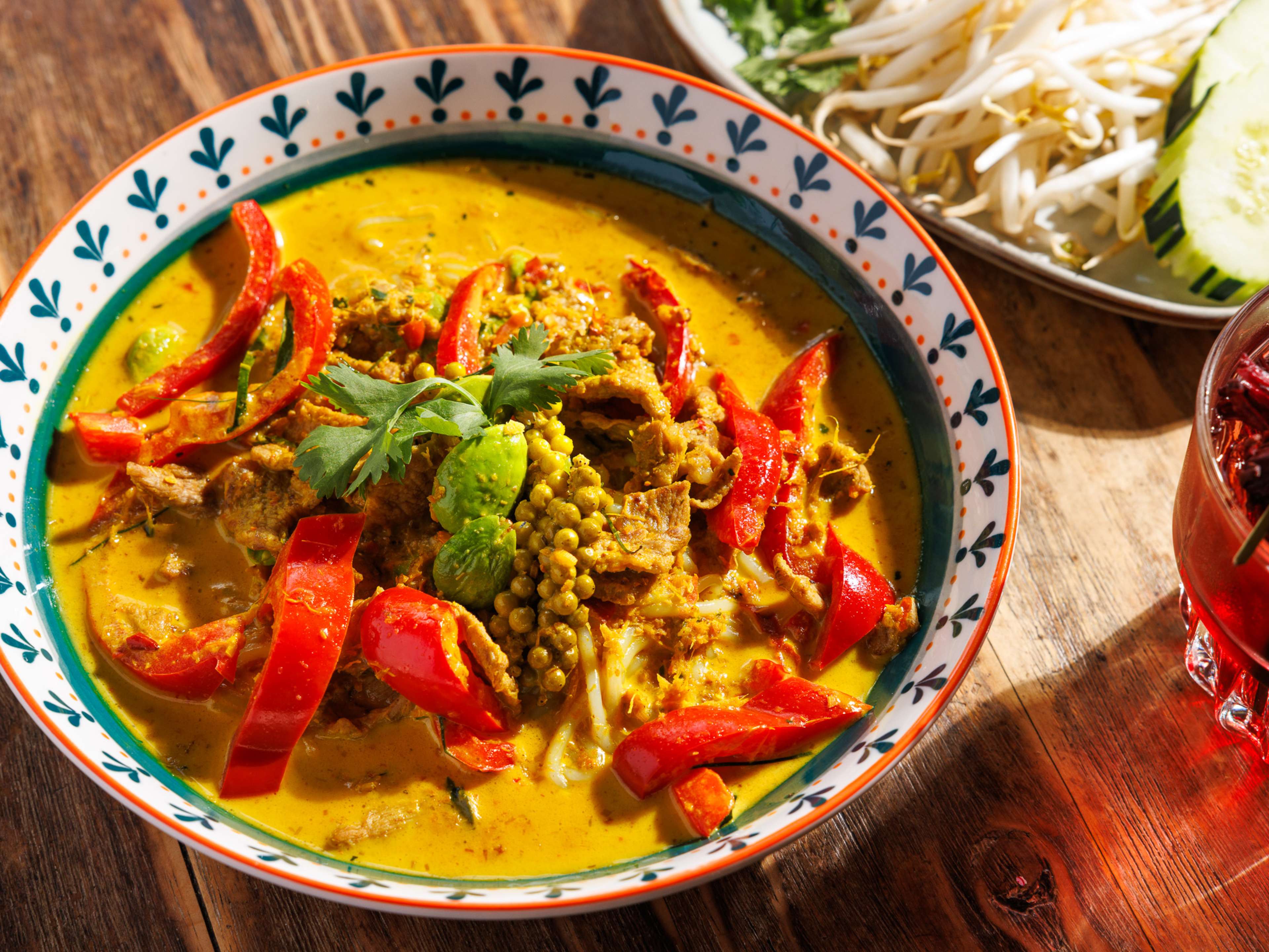 a yellow Thai curry with noodles