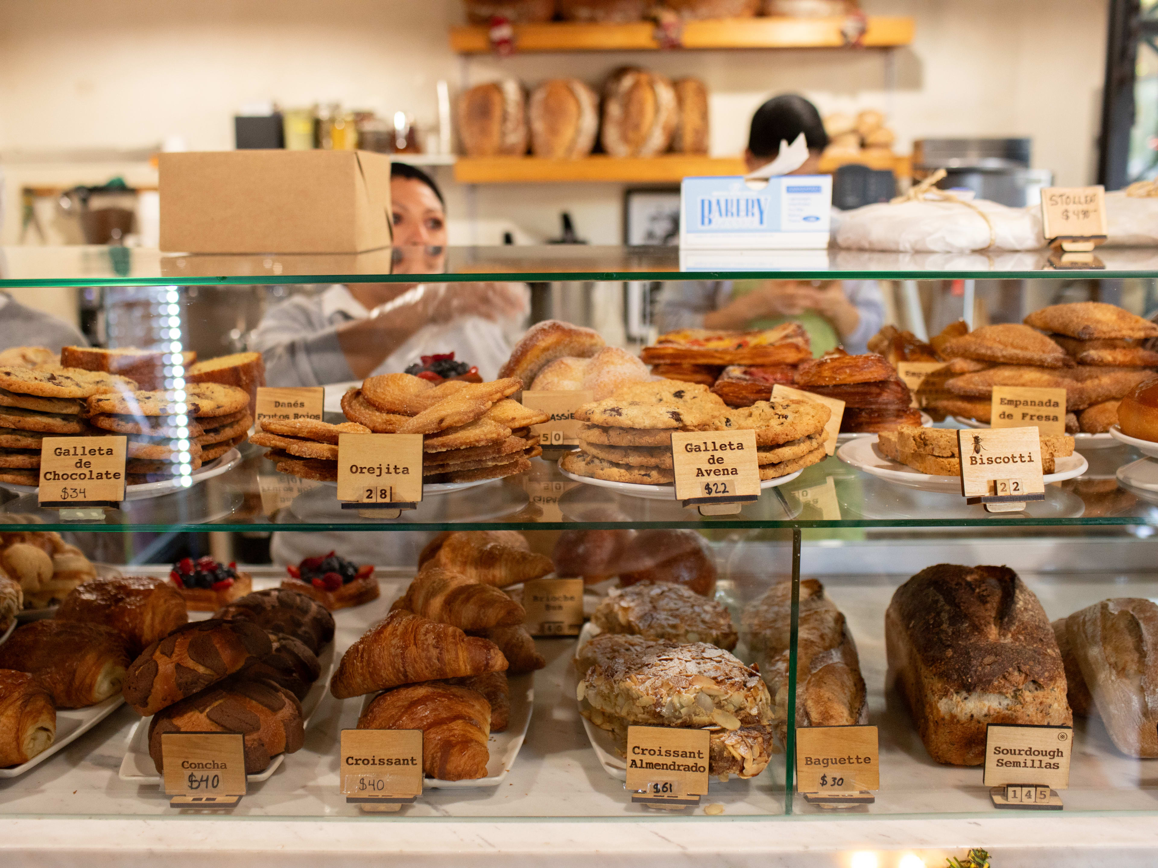 Pastry case with baked goods at Saint