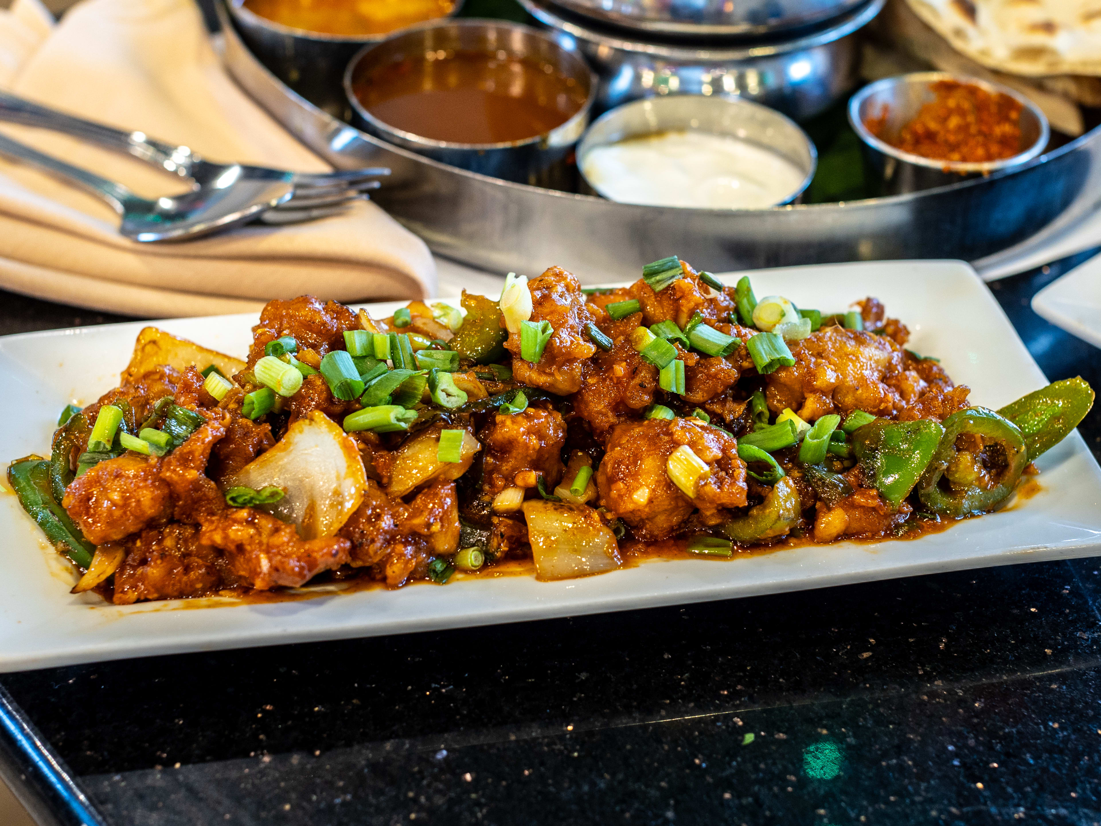 The dry chili chicken from Sangam Chettinad.