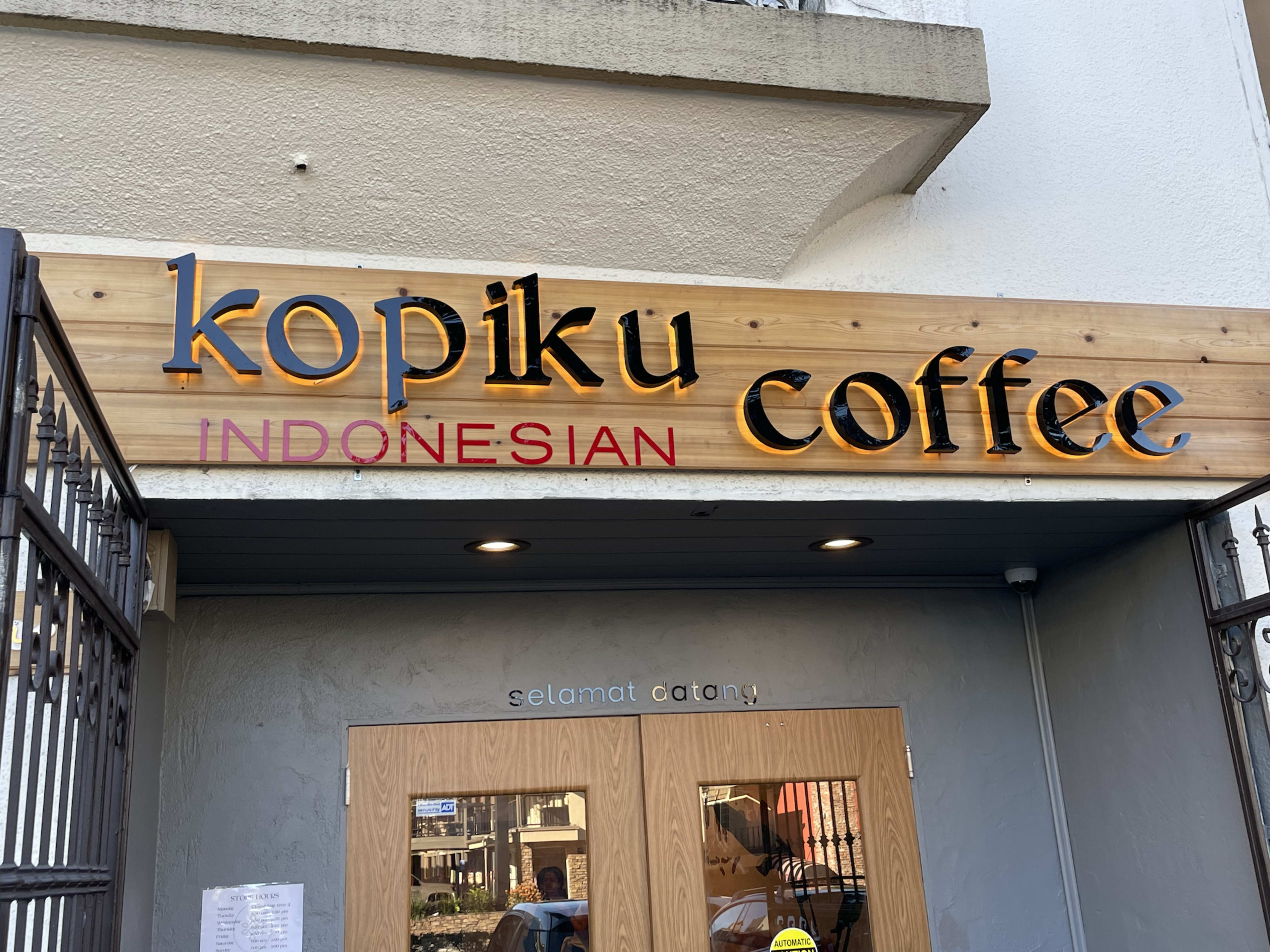 The exterior sign at Kopiku Indonesian Coffee