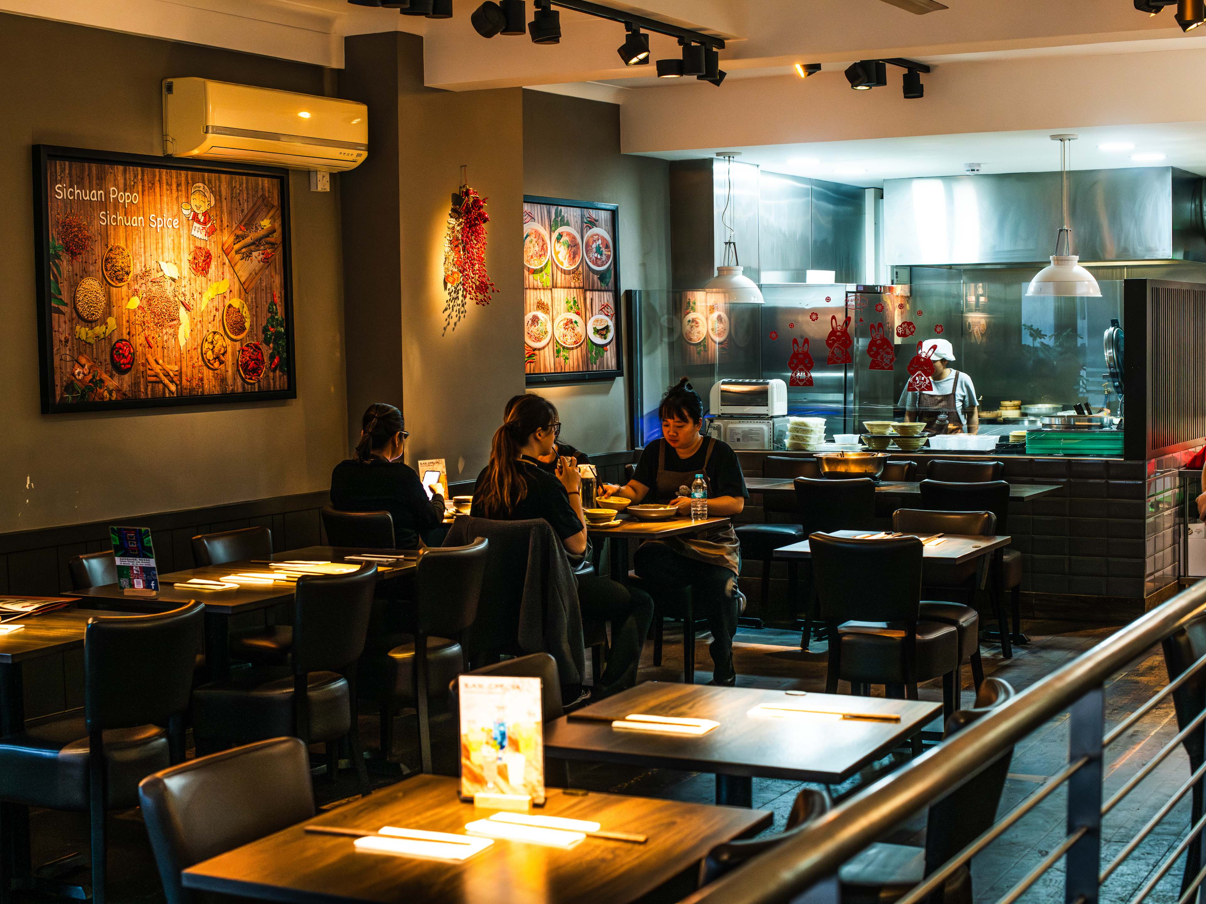 The dining area and open kitchen at Sichuan Popo.