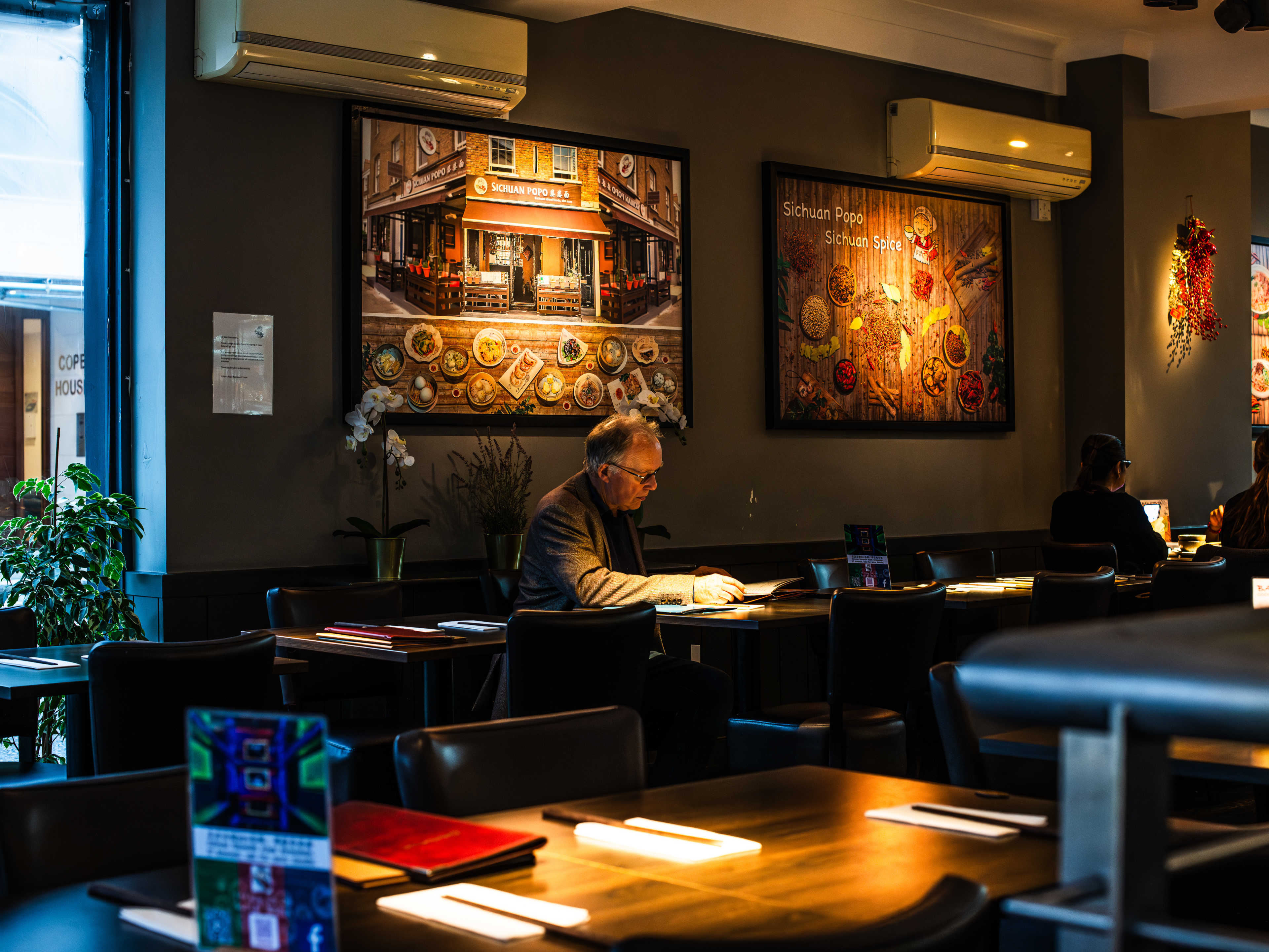 person dines at a table at Sichuan Popo.