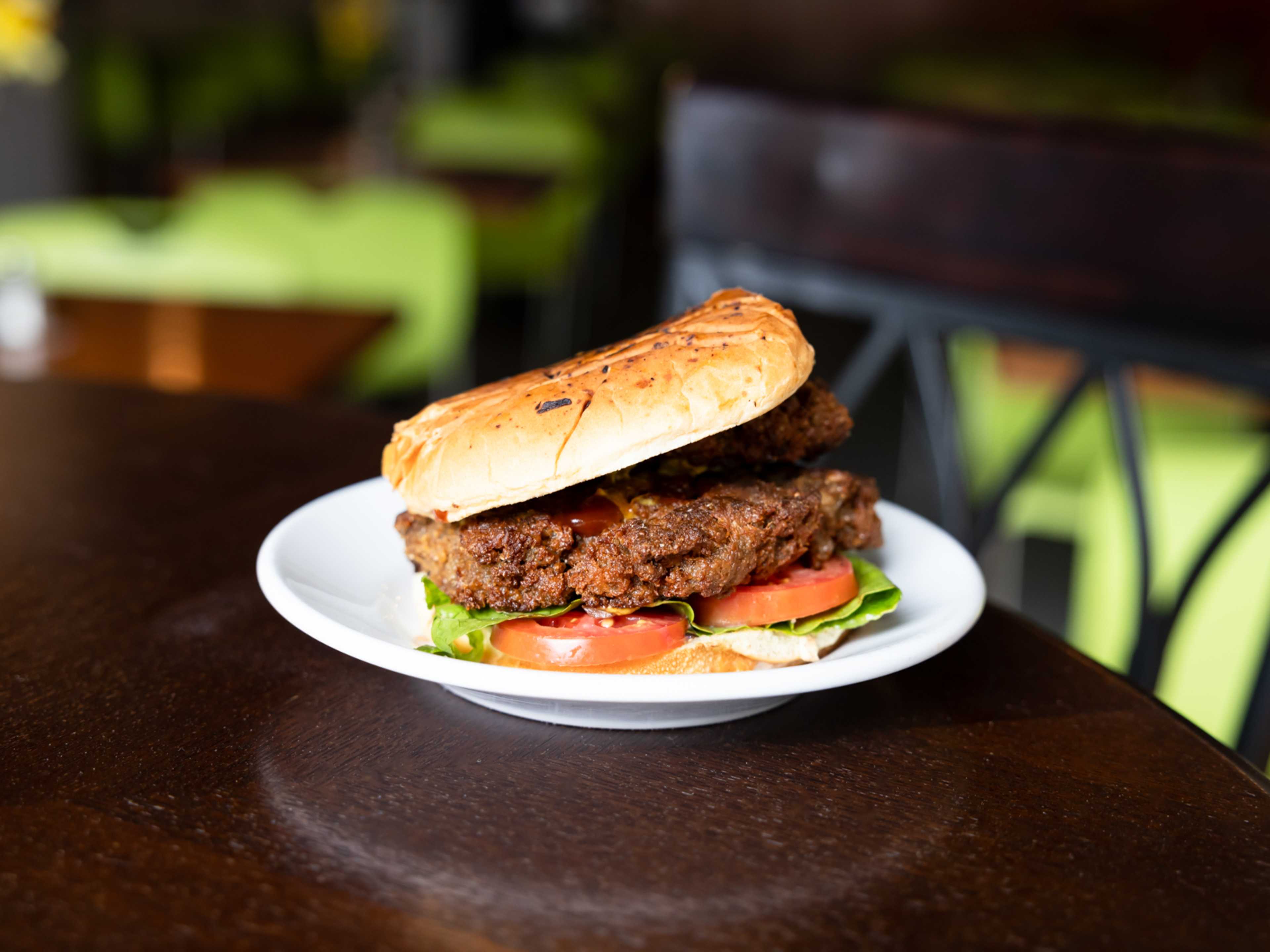 The Garvey burger with tomato and lettuce.