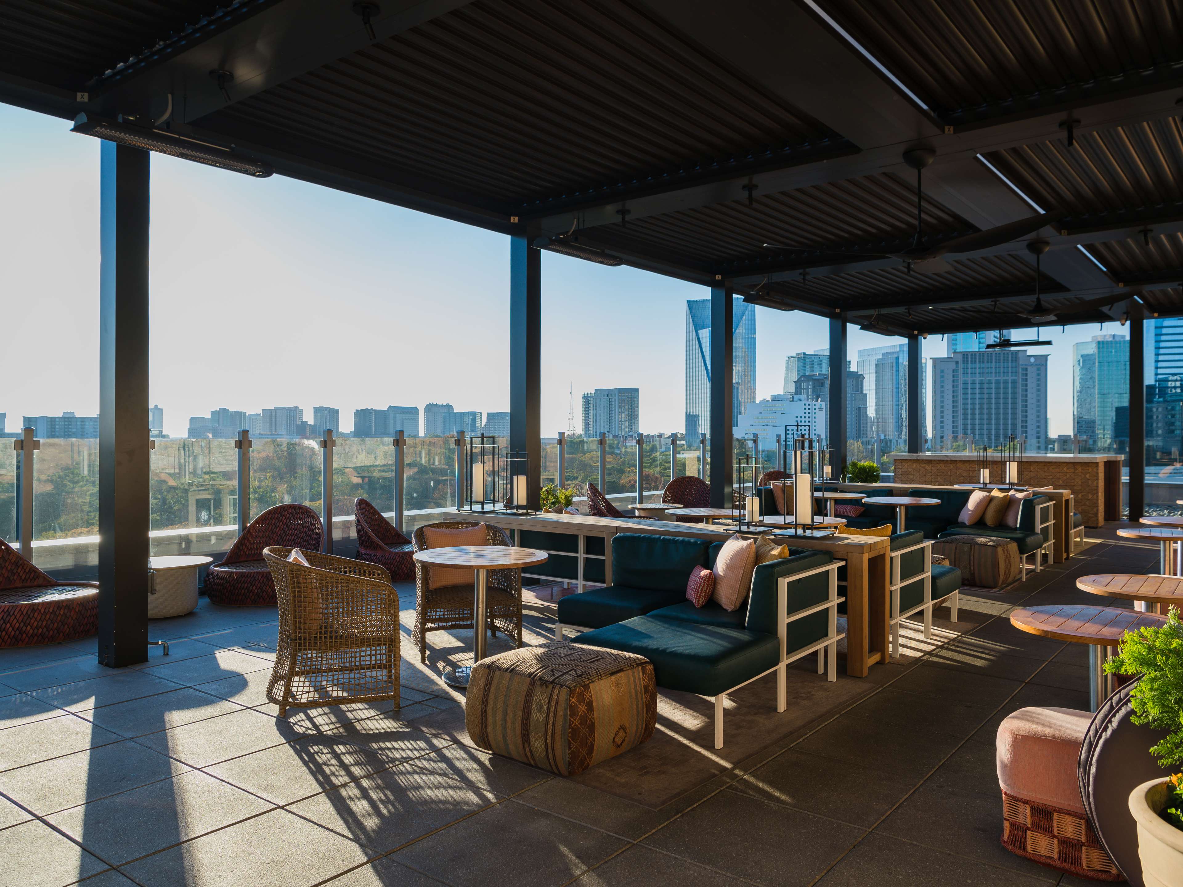 A rooftop patio overlooking tall Buckhead buildings.