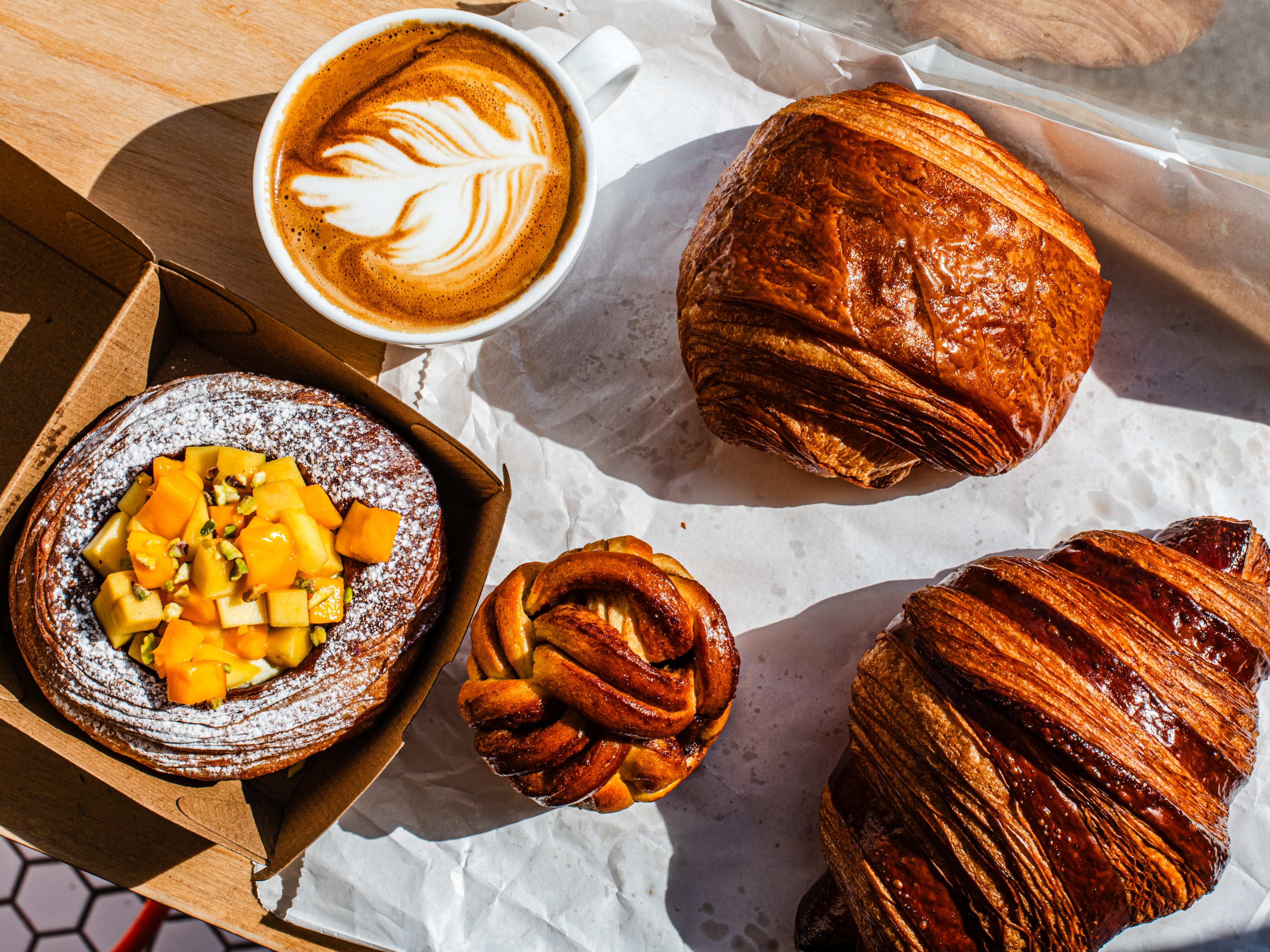 A spread of pastries and a latte from Suba Bakery.