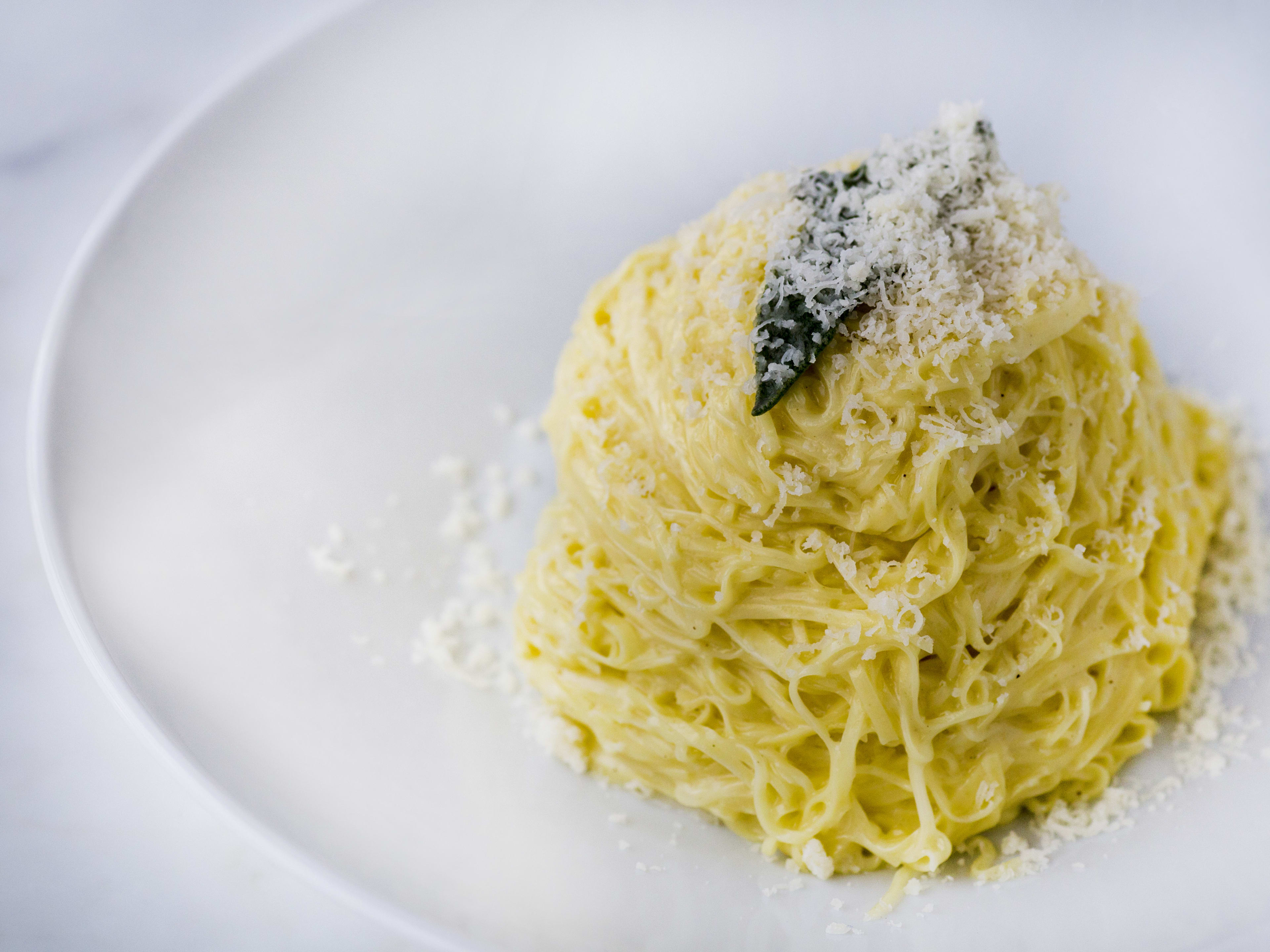 pile of tajarin pasta with butter and sage