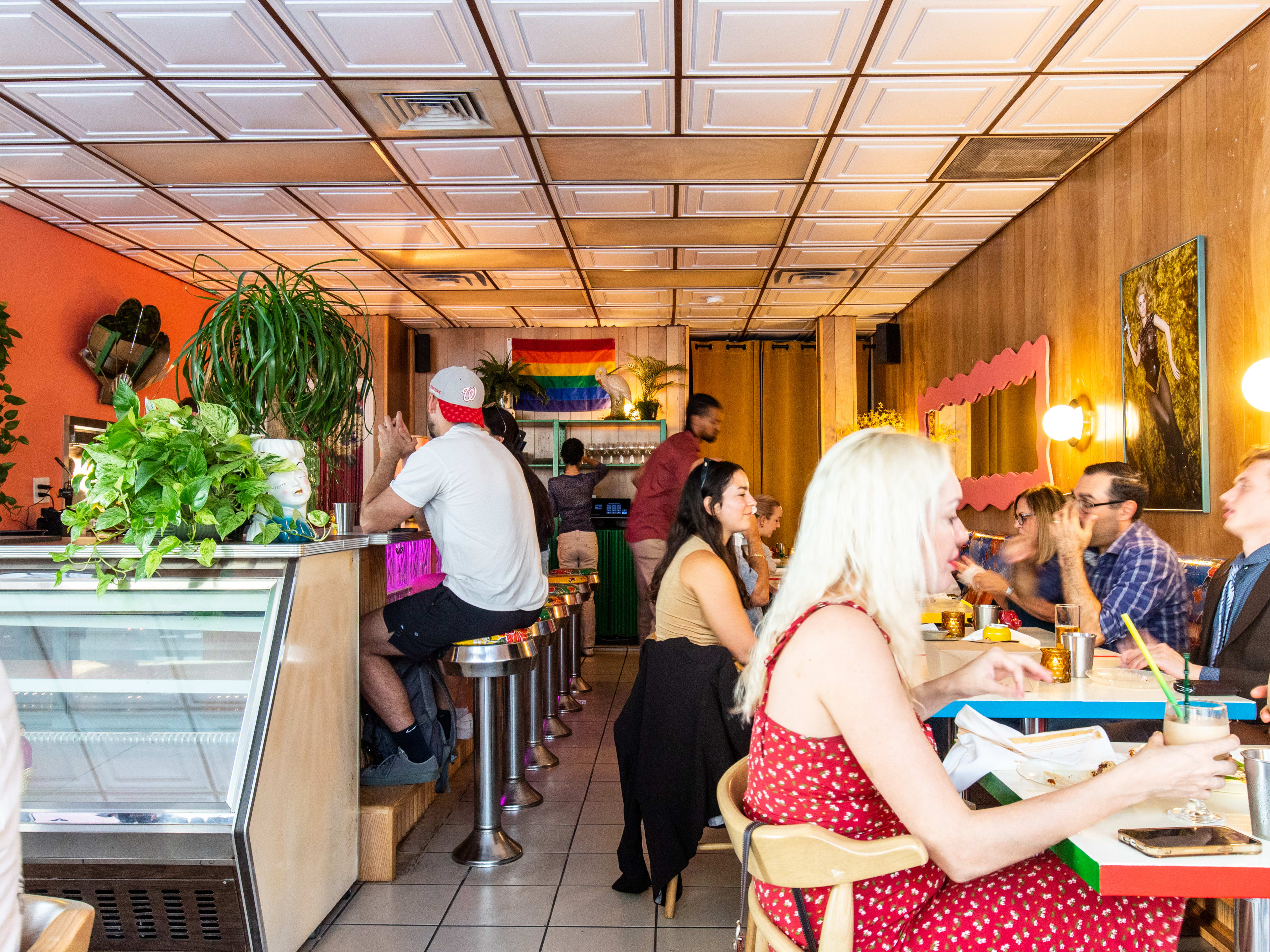 retro restaurant interior with wood paneling along walls