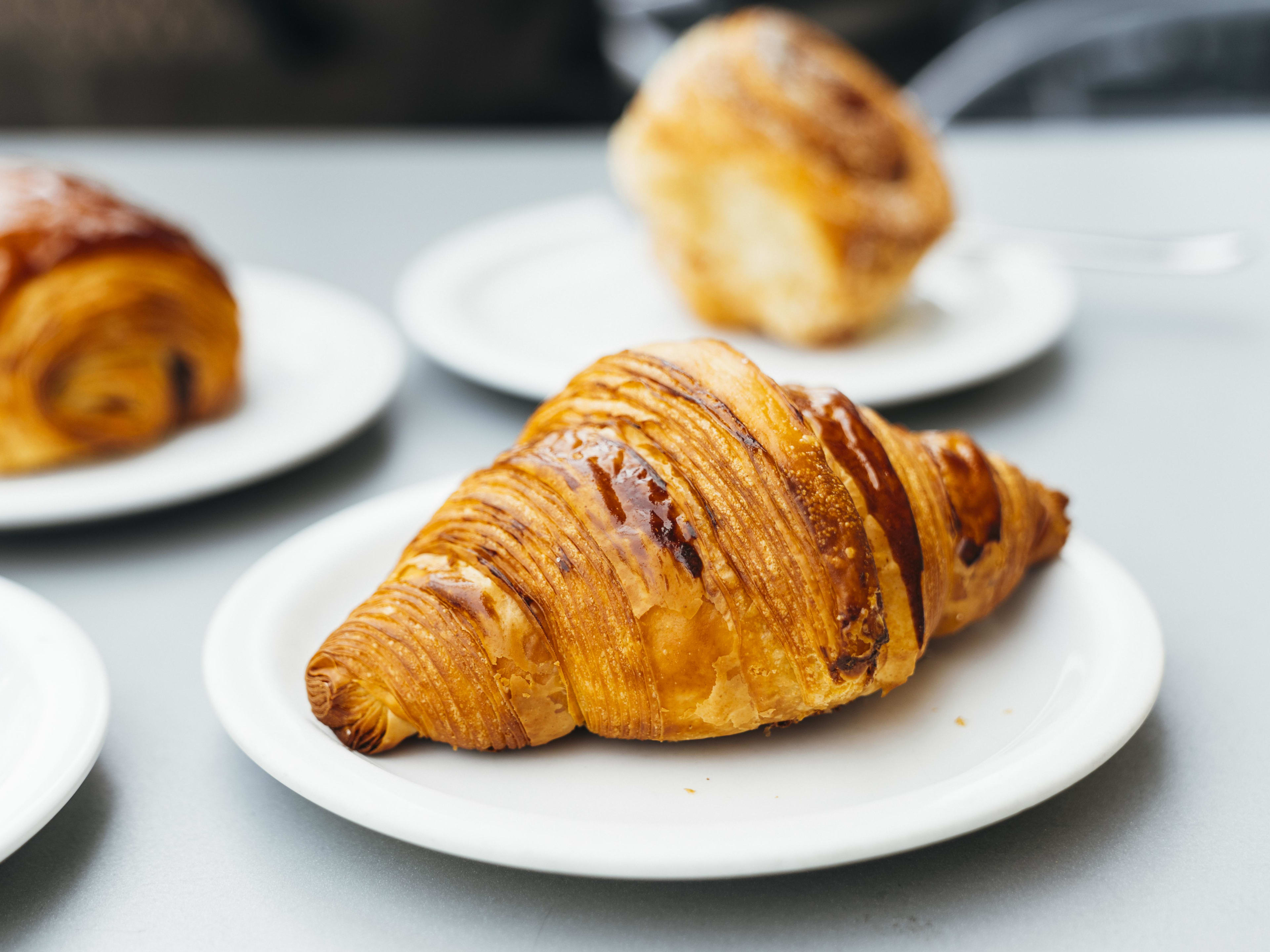 spread of pastries like croissants and morning bun