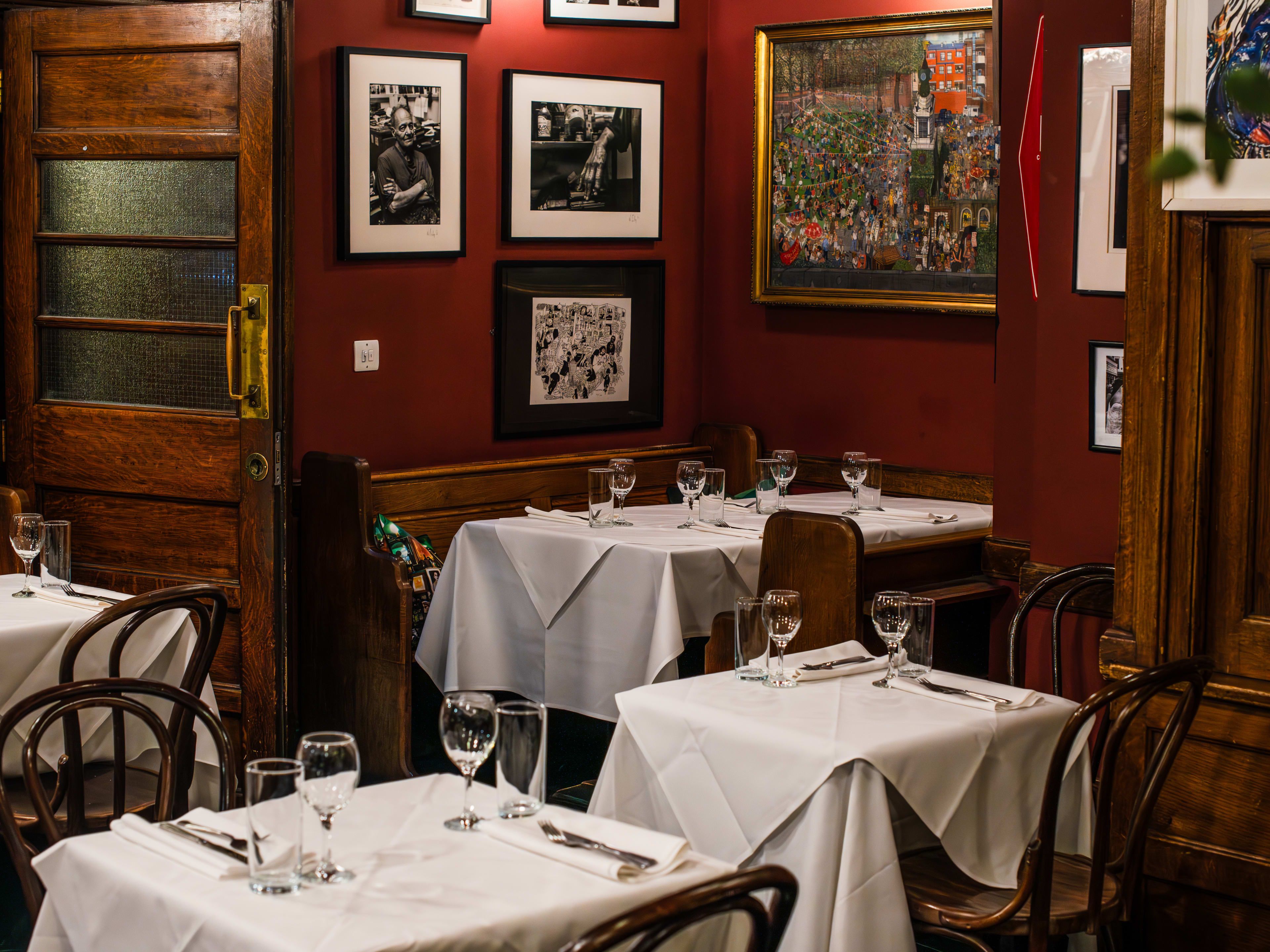 A corner booth in the upstairs dining room of The French House.