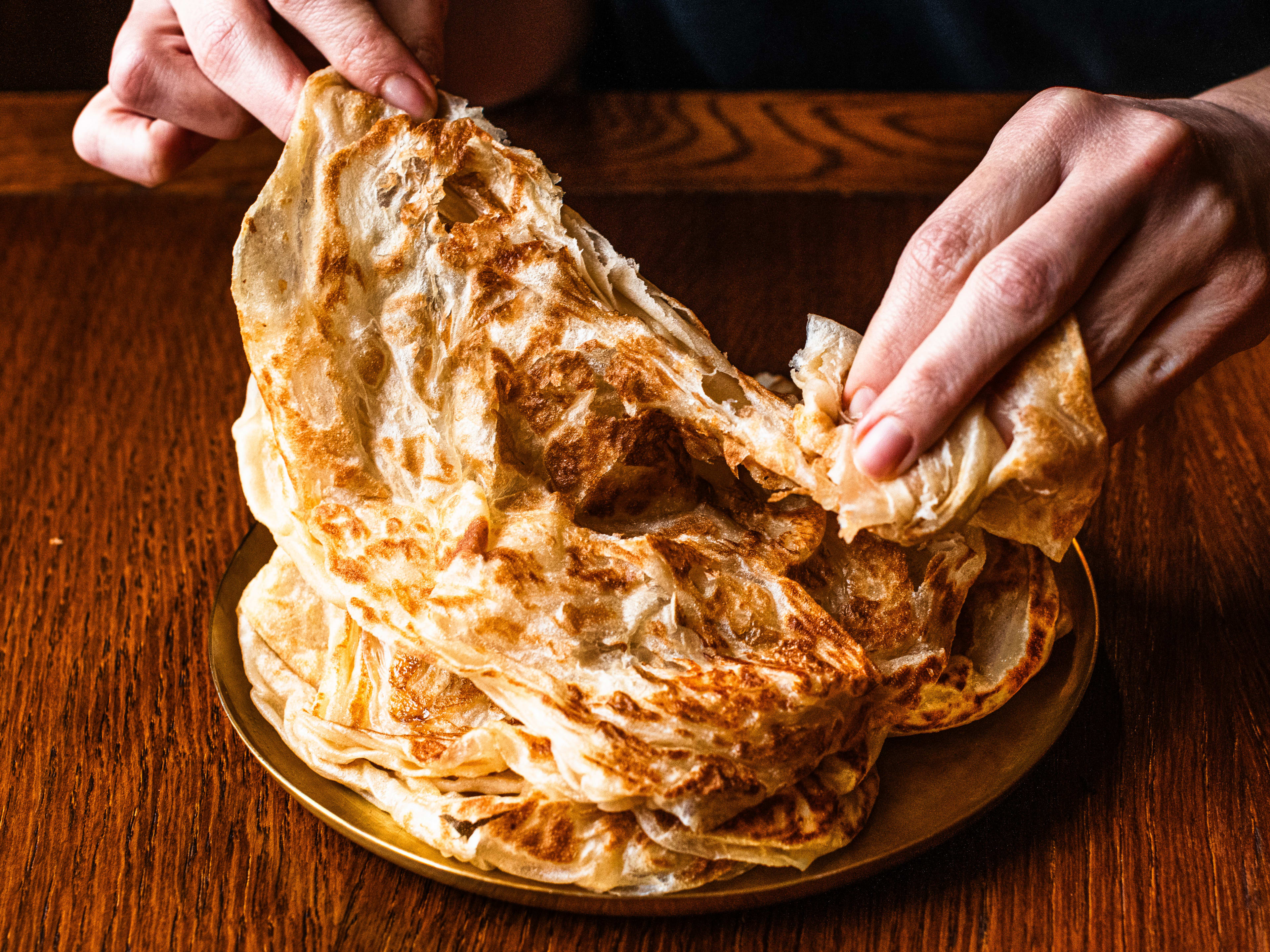 The buttery, flaky roti at The Tamil Crown.