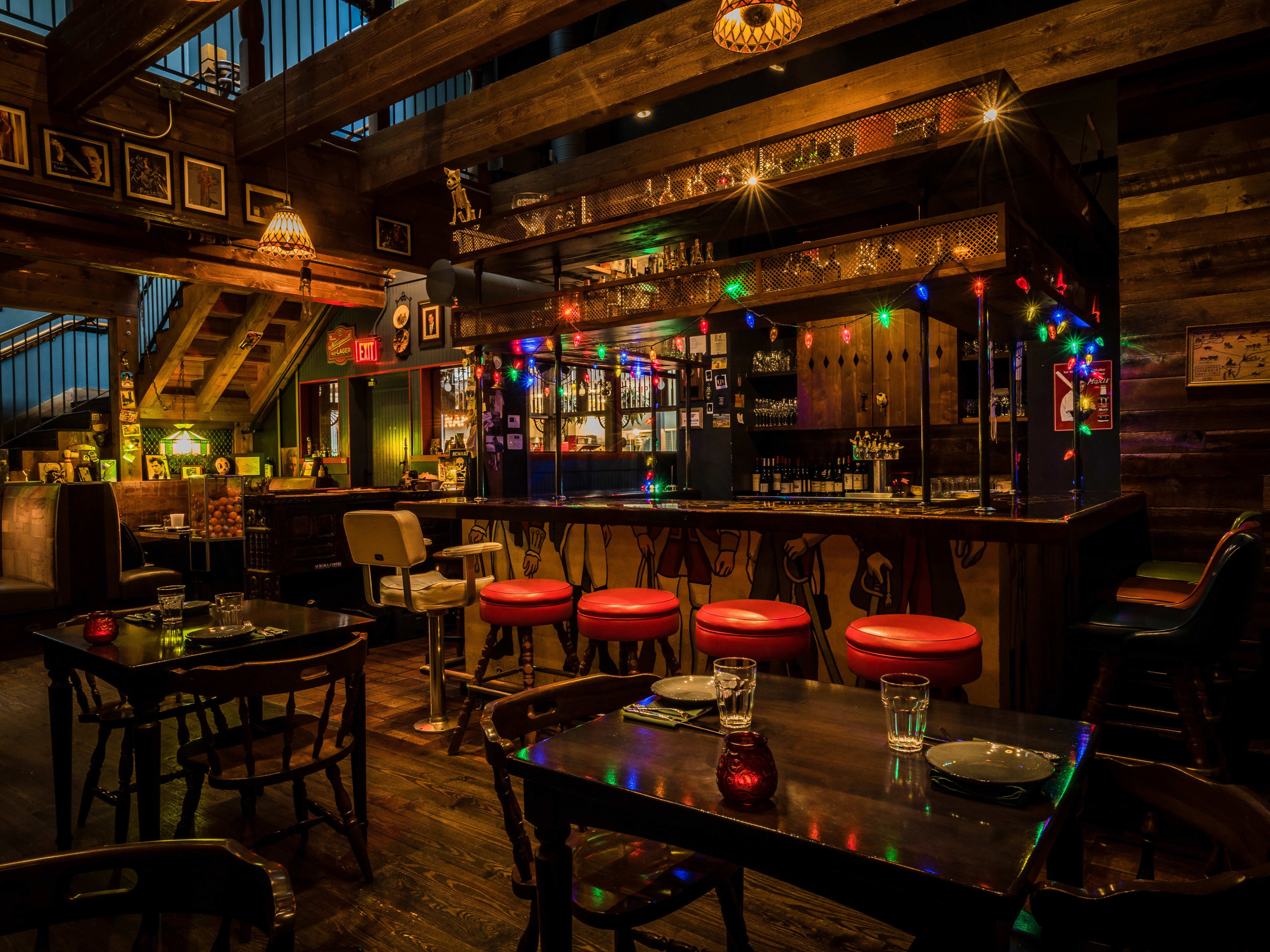 A bar framed in Christmas lights.