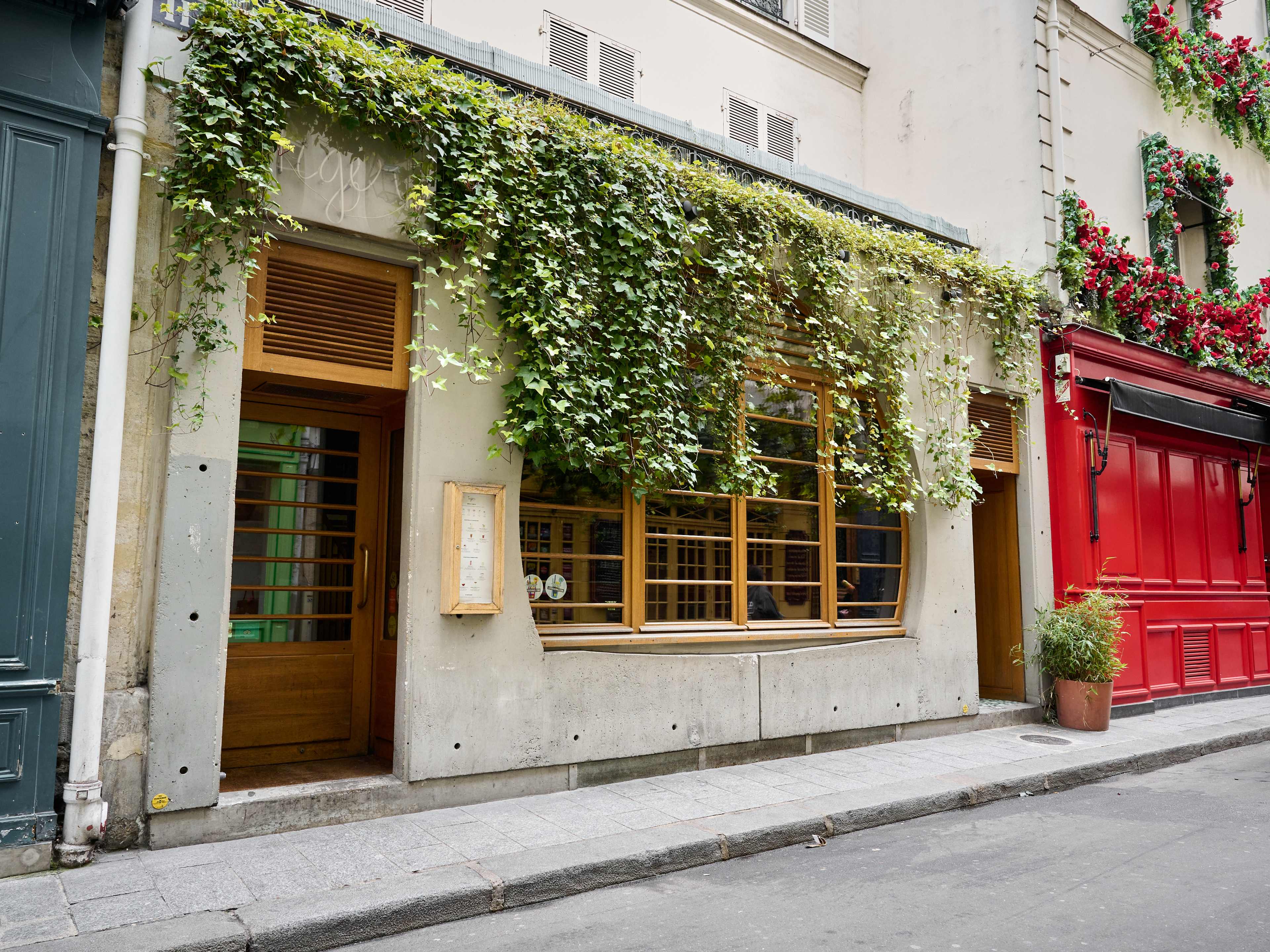 Stone exterior of Tiger covered with long ivy vines