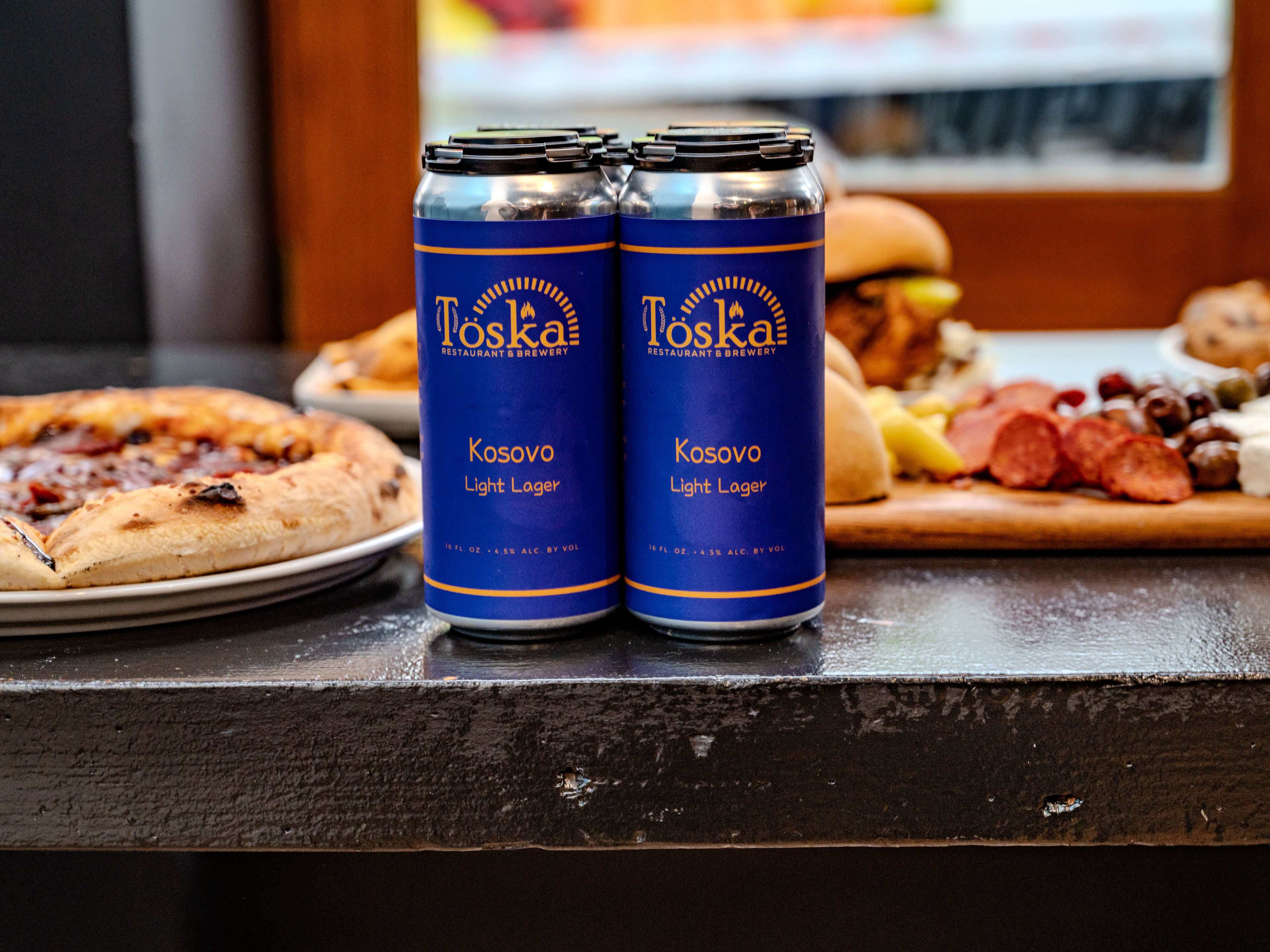 This is a six pack from Toska Restaurant and Brewery.