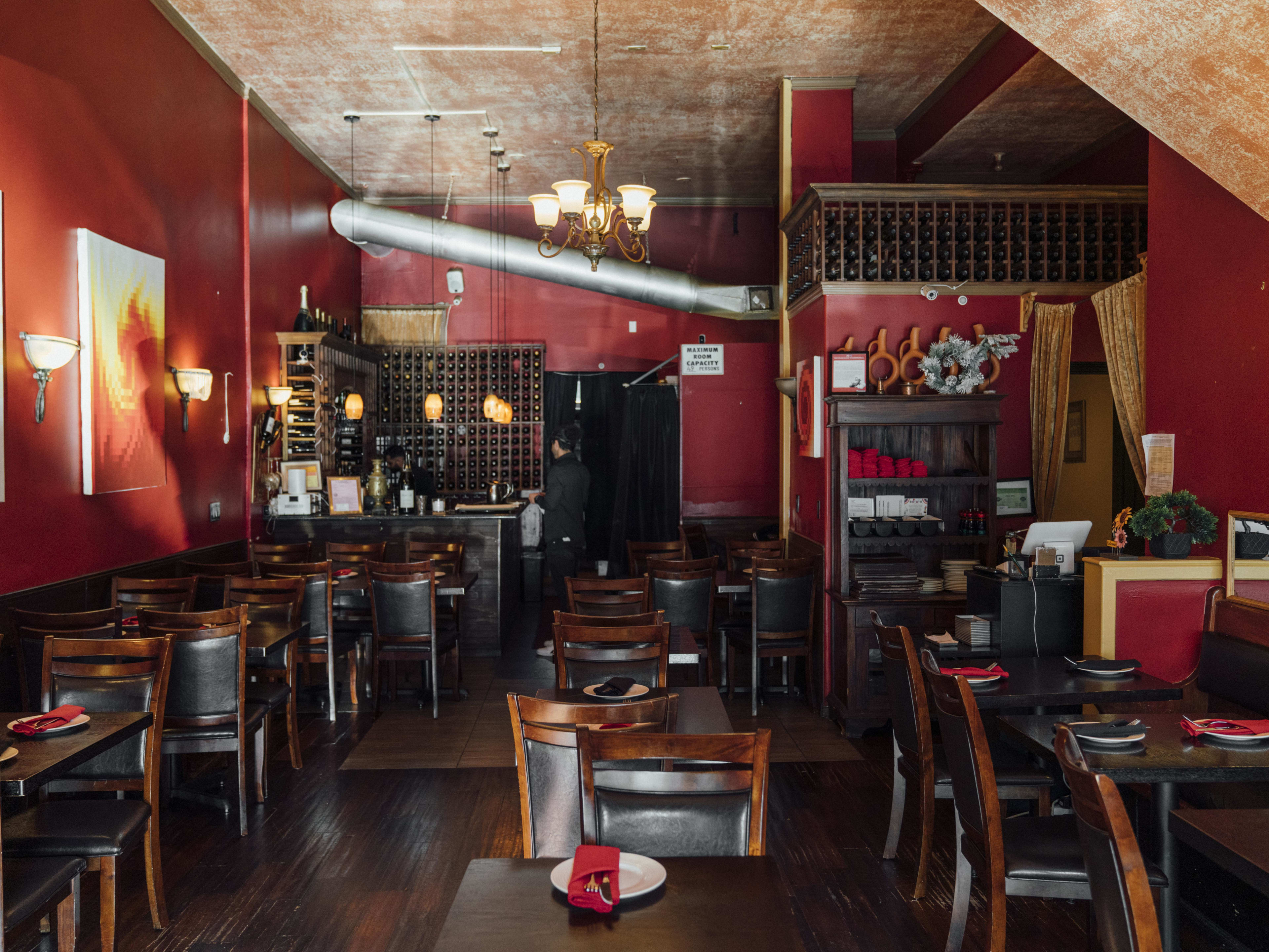 The red-toned interior at Tuba