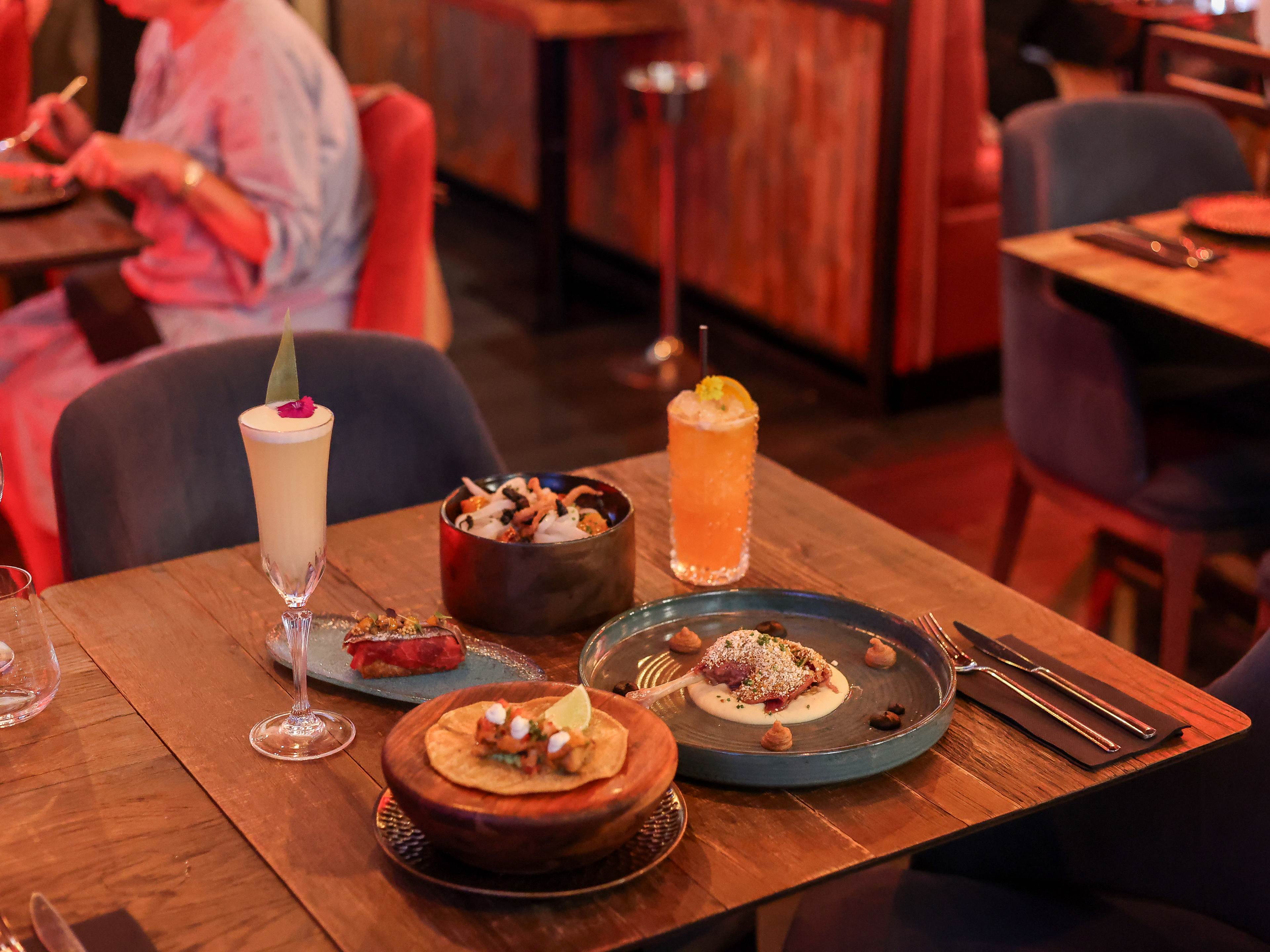 spread of tapas at nighttime restaurant