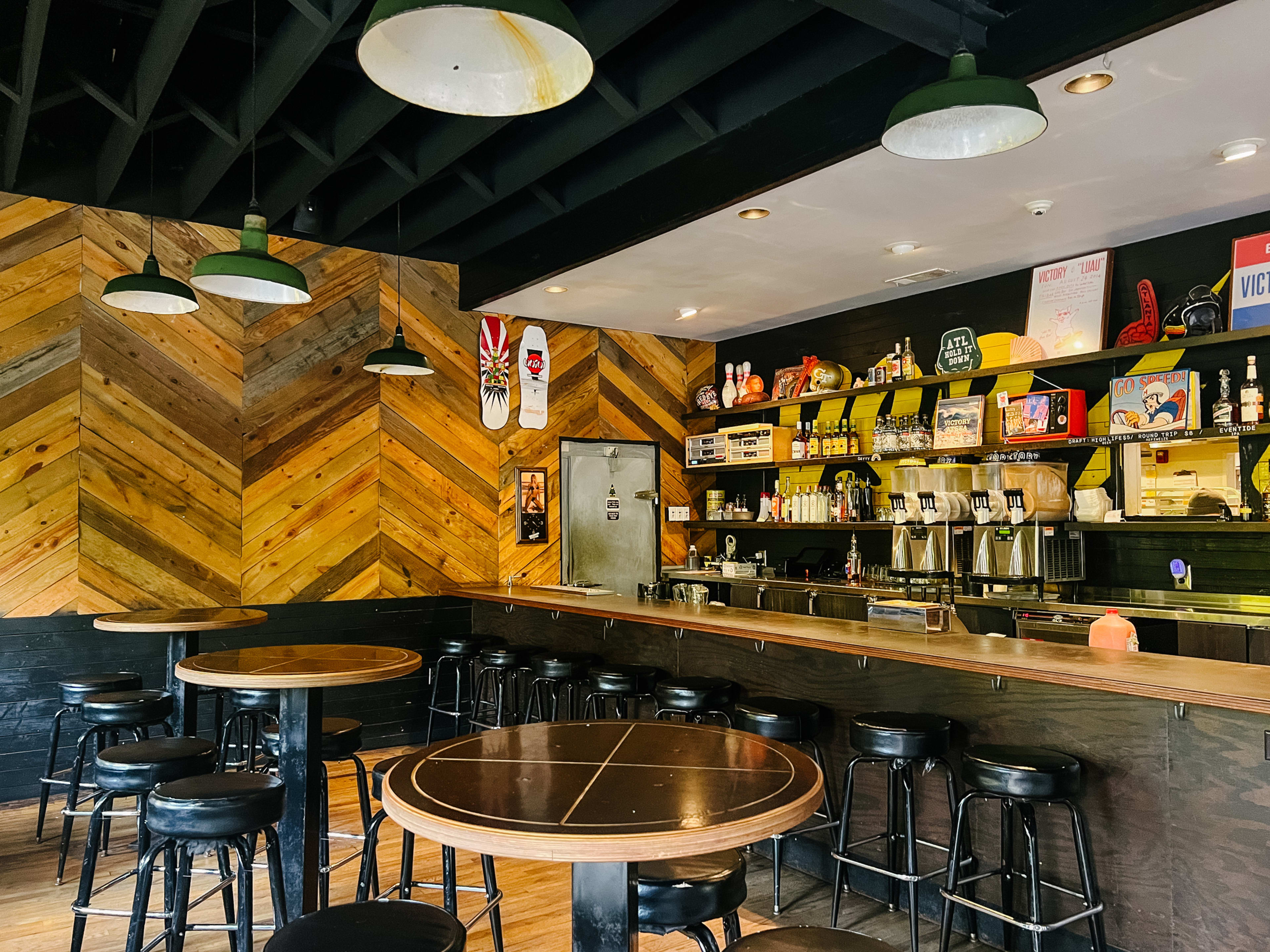 The dark, wood-paneled bar inside Victory in Atlanta.