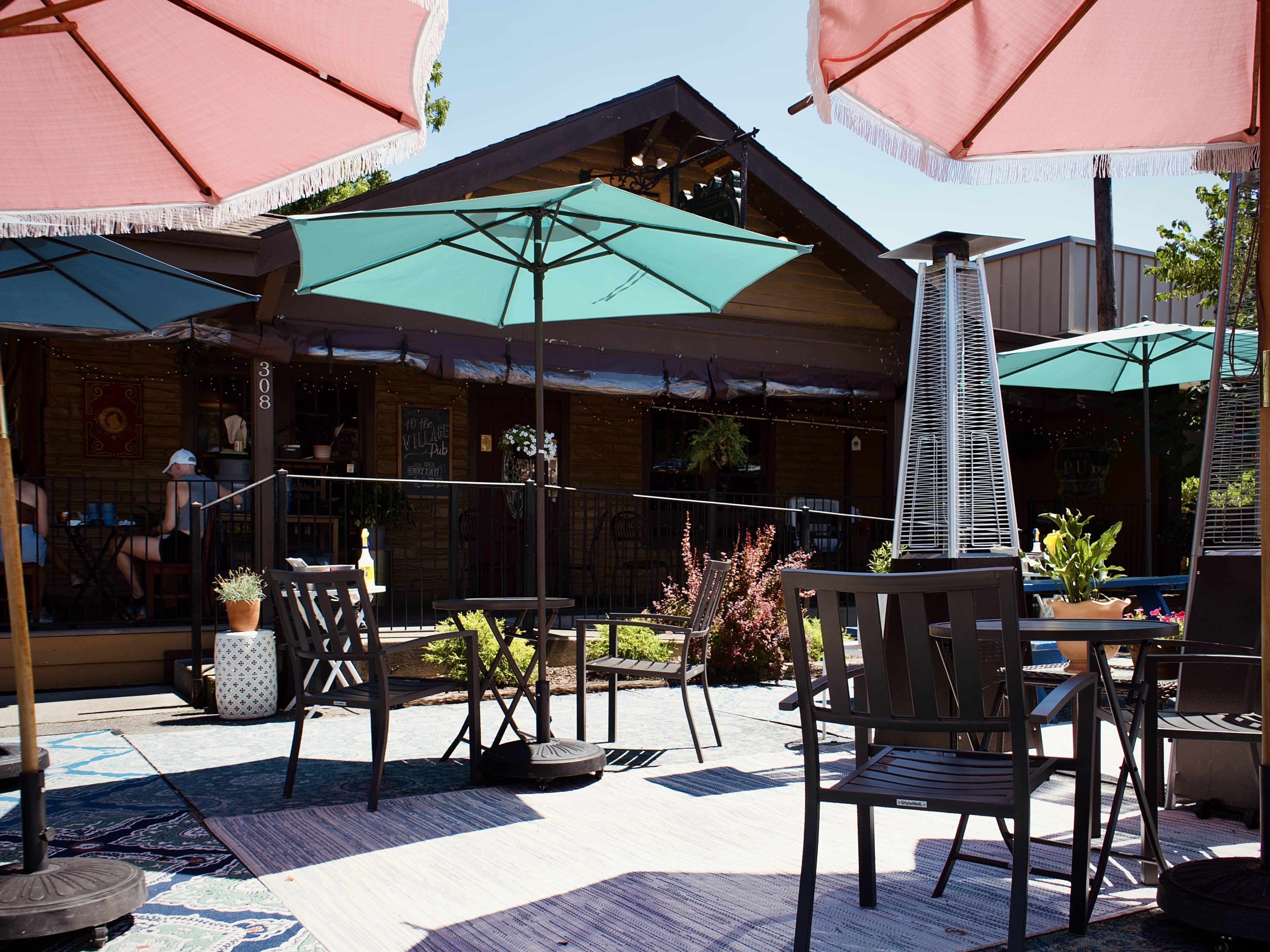 patio with green umbrellas