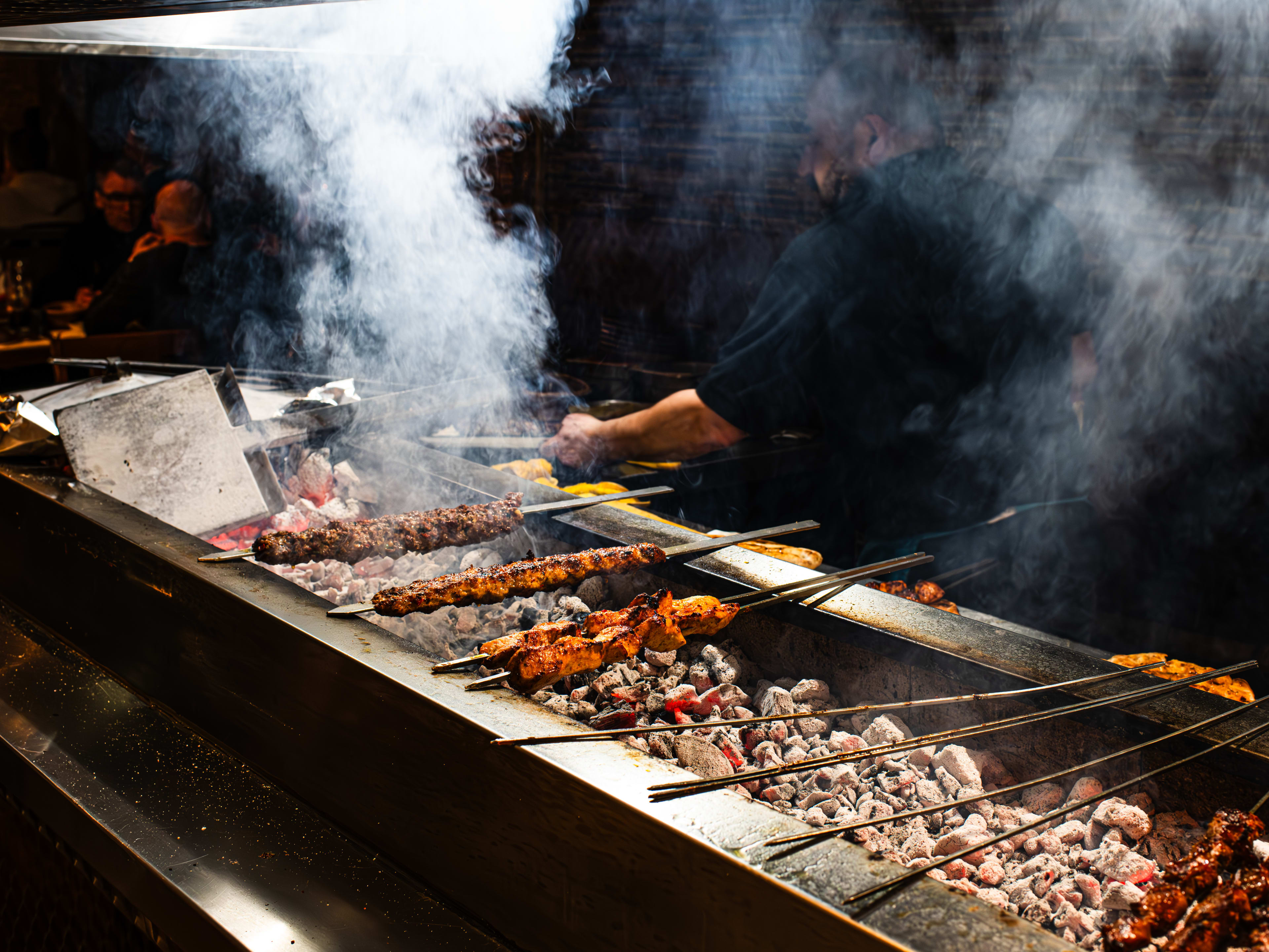 A sizzling ocakbasi grill.