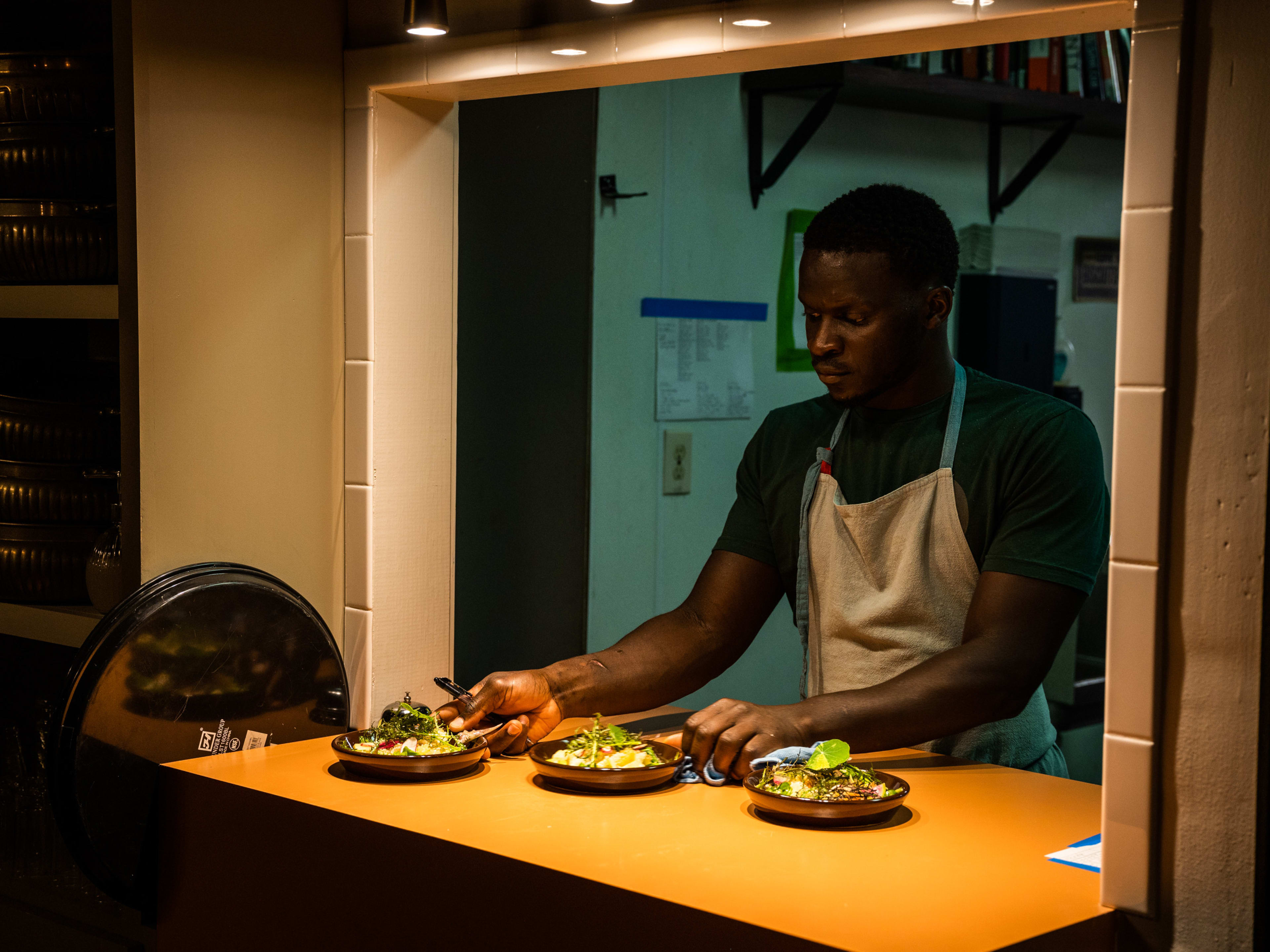 Back of house employee plating courses.