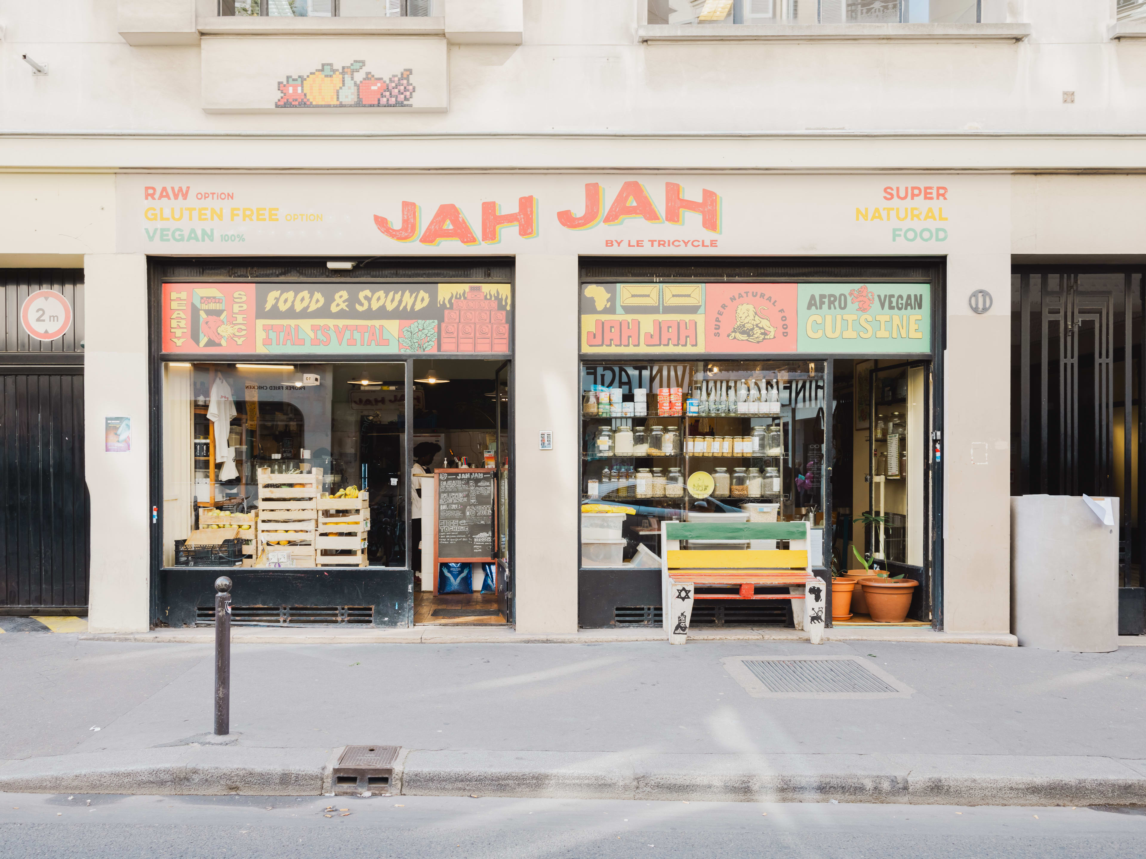 The colorful exterior of Jah Jah, a Afro Vegan restaurant in Paris