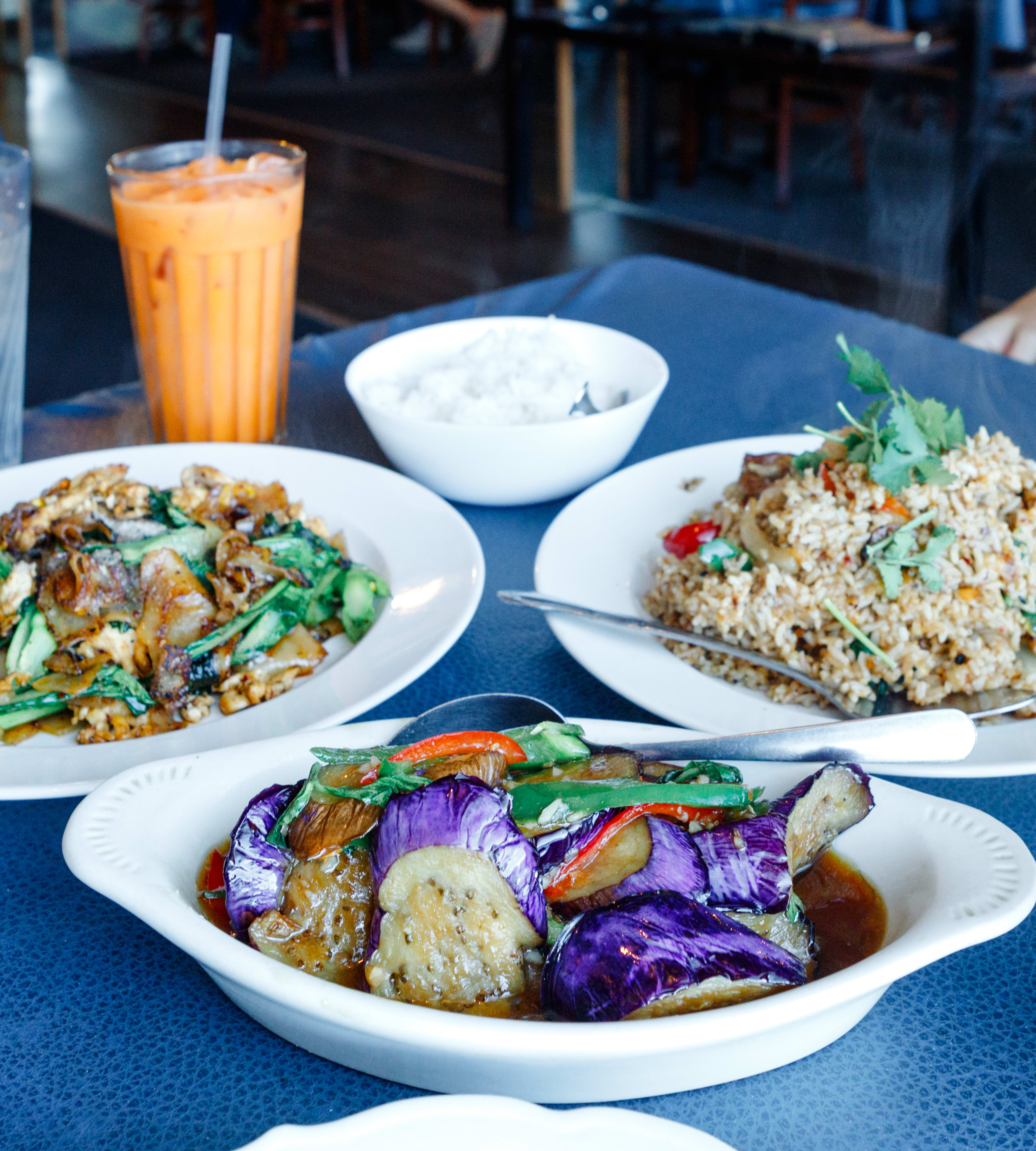 colorful thai food on a blue table