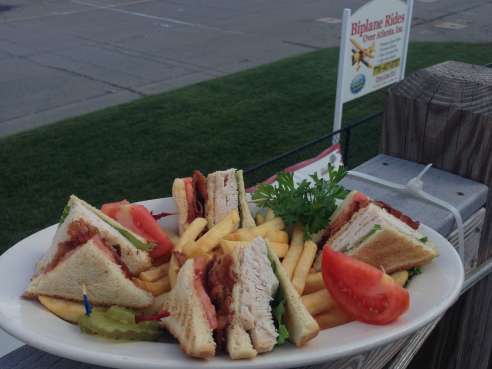 Downwind Restaurant and Lounge by Courtesy of Downwind