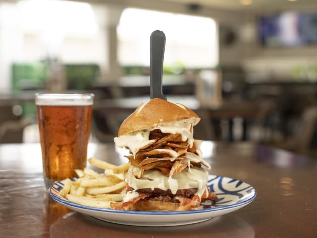 Teak Neighborhood Grill by Carlos Amoedo