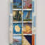 Harriete Estel Berman, Seder Plate A Woman Belongs on the Bimah as Much as an Orange Belongs on a Seder Plate, Pre-printed steel dollhouses, recycled tin containers, and Plexiglas, 2000 - Thumbnail 0
