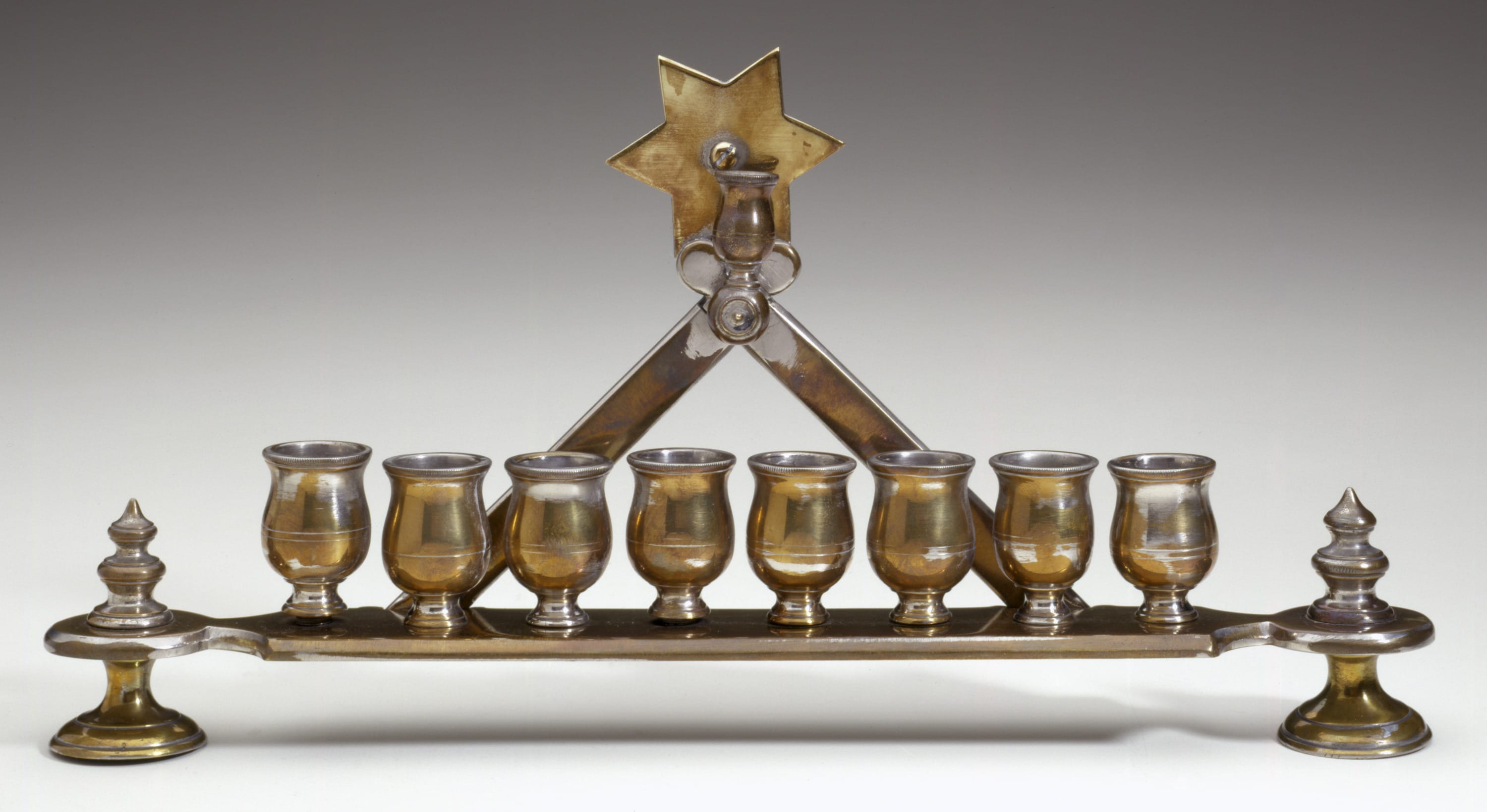 Hanukkah Lamp, White metal: cast and brass-plated, early 20th century