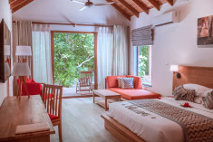 Deluxe Beach Villa at Reethi Faru Resort, Raa Atoll, Maldives