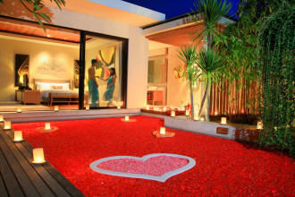 Candle lit romantic luxury villa with four poster bed and private pool