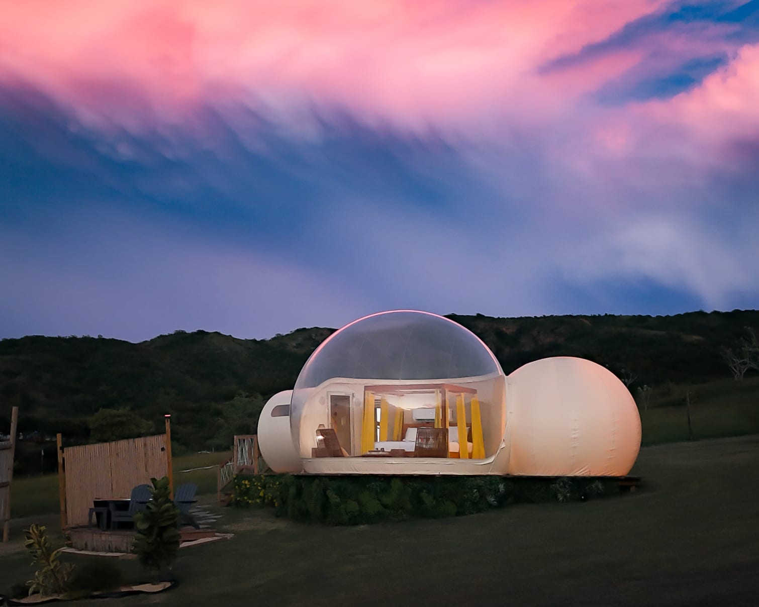 Bubble glamping accommodation at Madre Tierra Glamping Puerto Rico at dusk