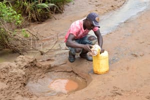 The Water Project: Mbakoni Community -  Fetching Water