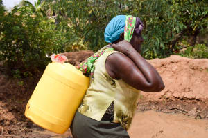 The Water Project: Utuneni Community A -  Carrying Water Home