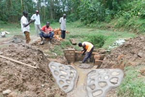 The Water Project: Wajumba Community, Wajumba Spring -  Bricking