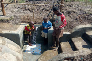 The Water Project: Chegulo Community, Sembeya Spring -  Children Celebrating The Water