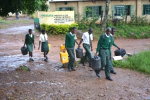 The Water Project: Makunga Secondary School -  Students Carrying Water