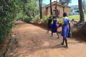 The Water Project:  Girls Head To The Stream To Get Water