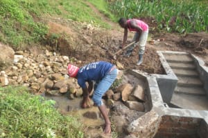 The Water Project:  Backfilling With Stones