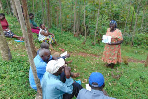 The Water Project: Kitulu Community, Kiduve Spring -  Participants Lead Discussions Using Posters