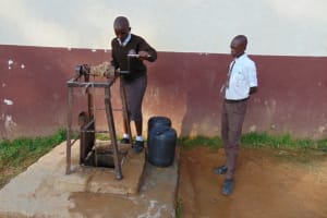 The Water Project:  Students Fetching Water