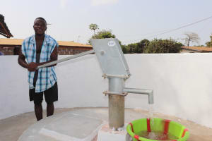 The Water Project:  Young Man Collecting Clean And Safe Drinking Water