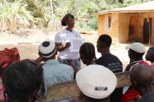 The Water Project:  Hygiene Facilitator Teaching About Latrines