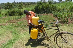 The Water Project:  Loading Bike With Water