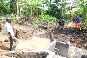 The Water Project:  Reinforcing The Walls With Clay